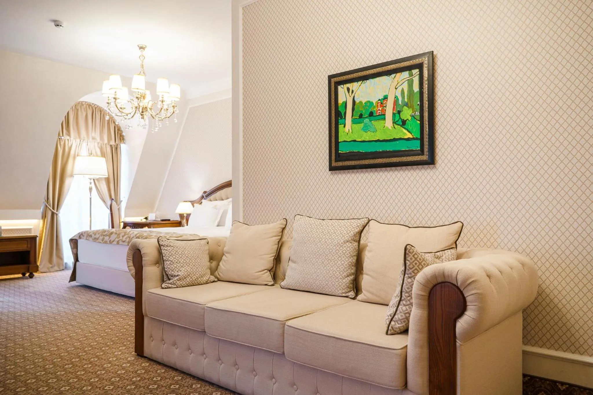 Seating area, Bed in Residence City Garden - Certificate of Excellence Top 10 BEST Five-Stars City Hotels for 2024 awarded by HTIF