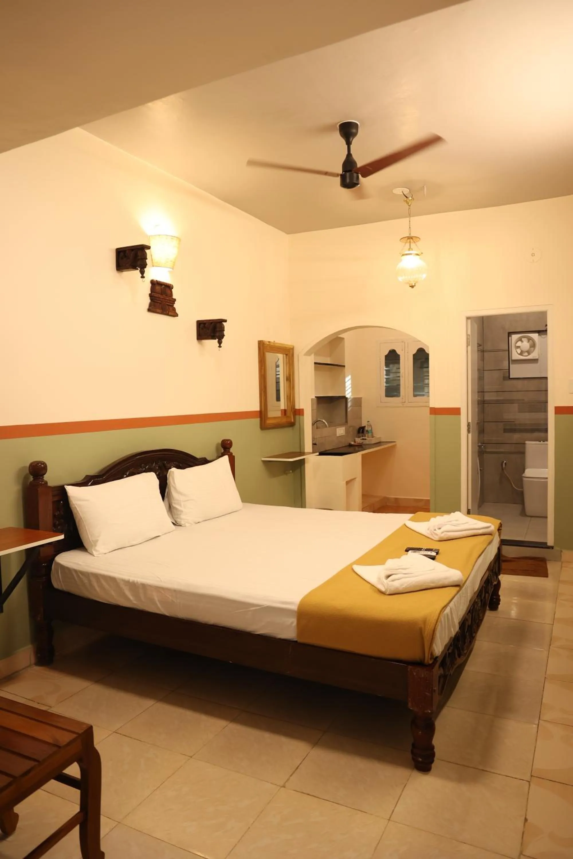 Bed in Dwaraka Guest House