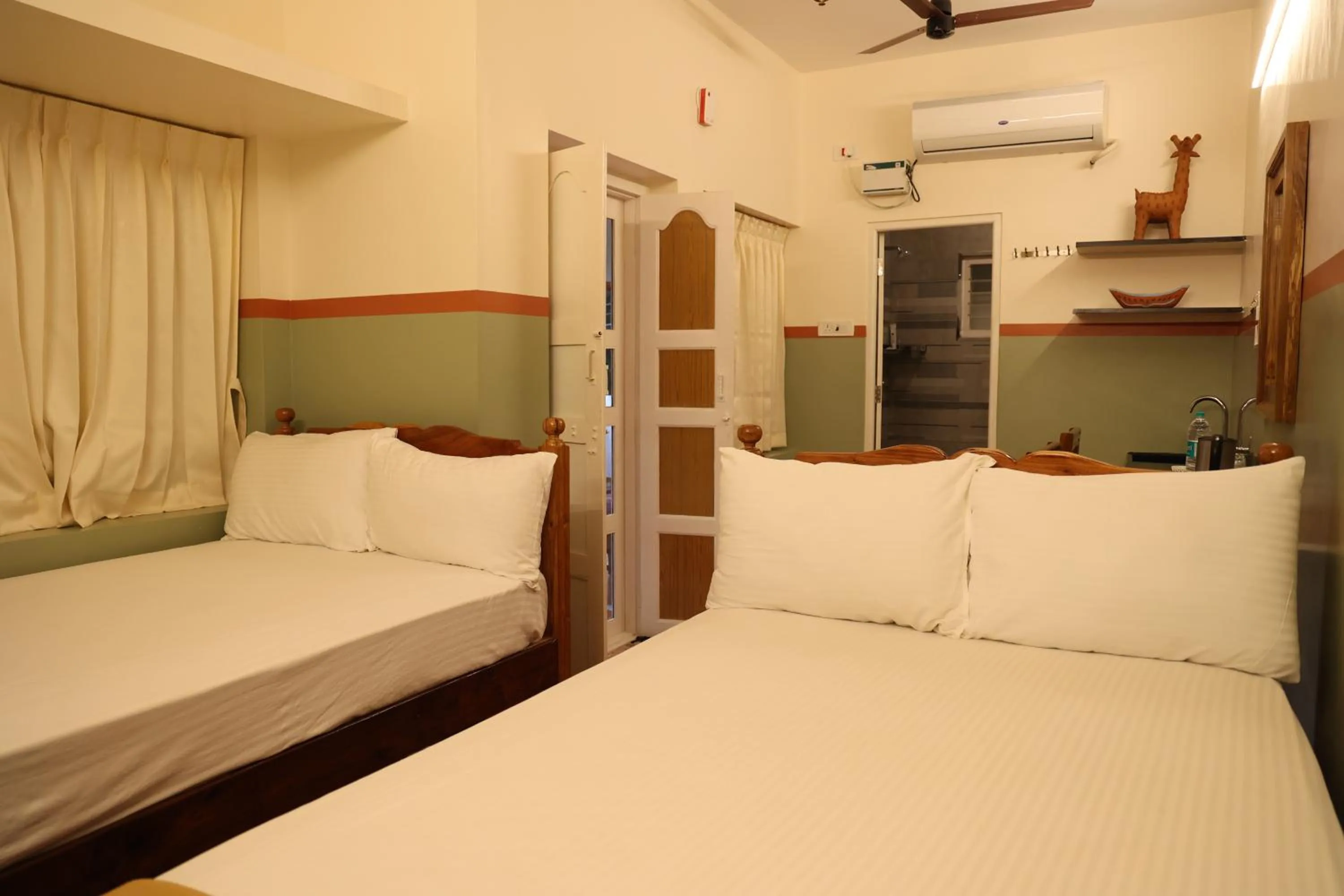 Bed in Dwaraka Guest House
