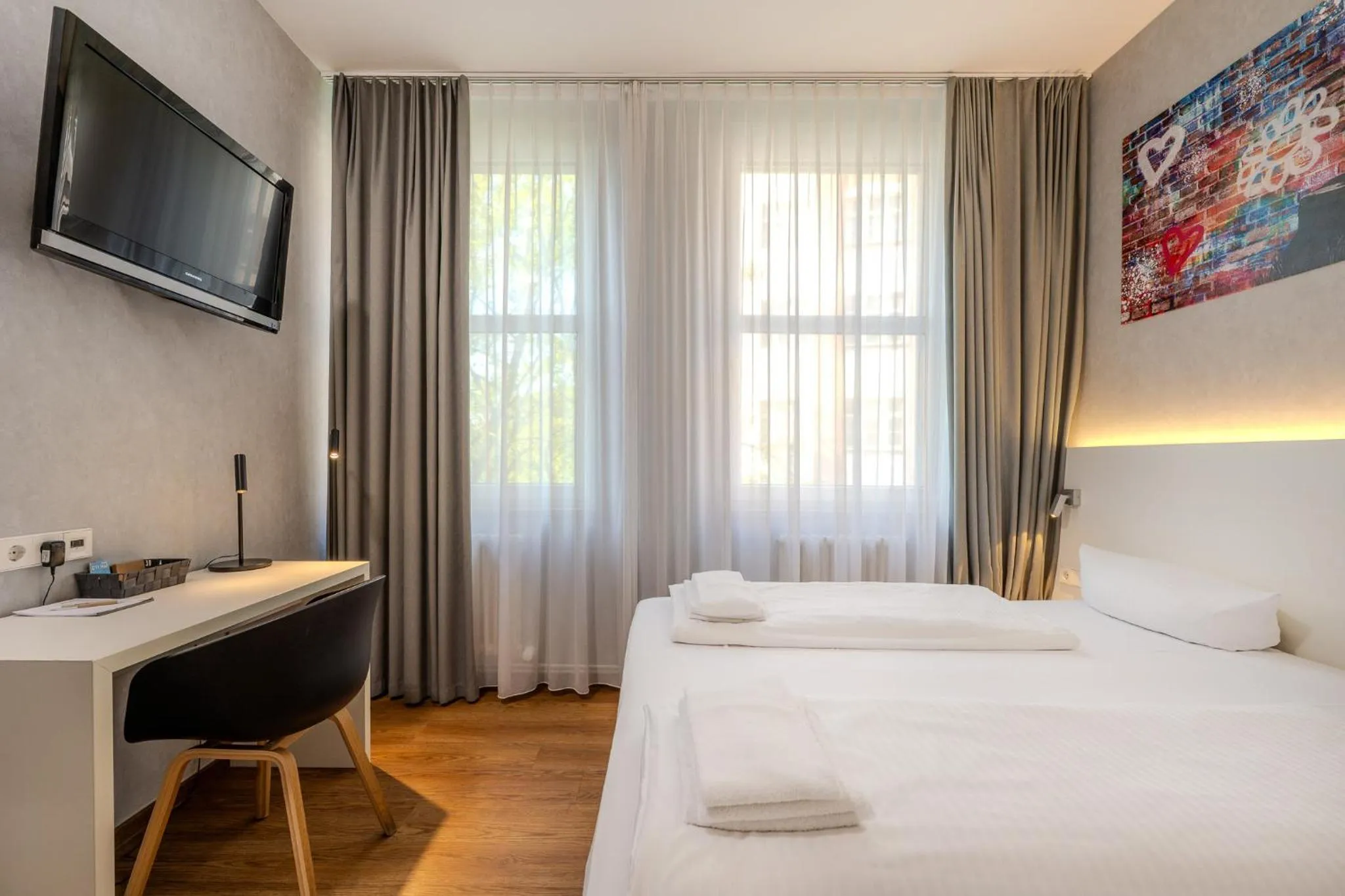 Photo of the whole room, Bed in mk hotel berlin