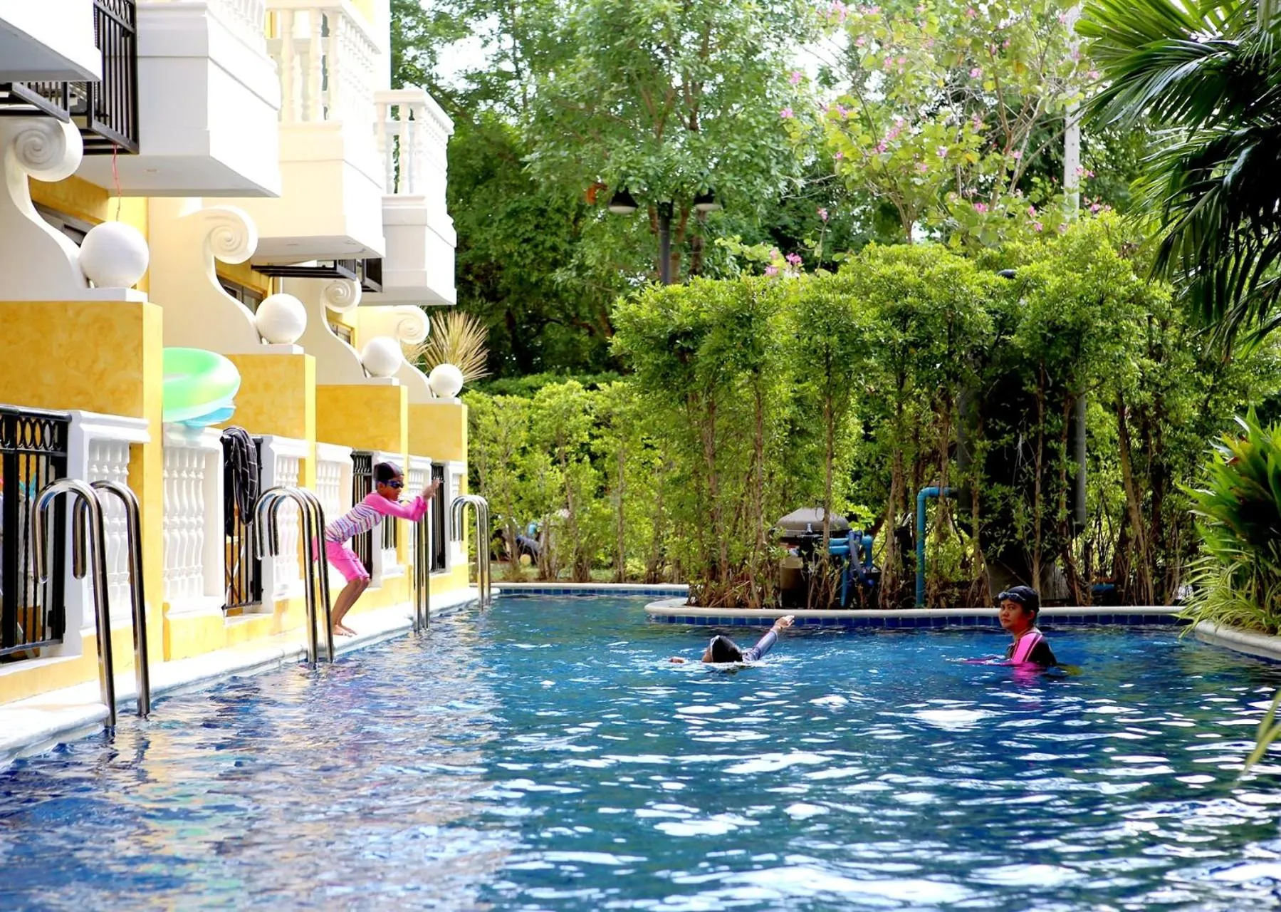 People in Venetian Poseidon Pool Hotel