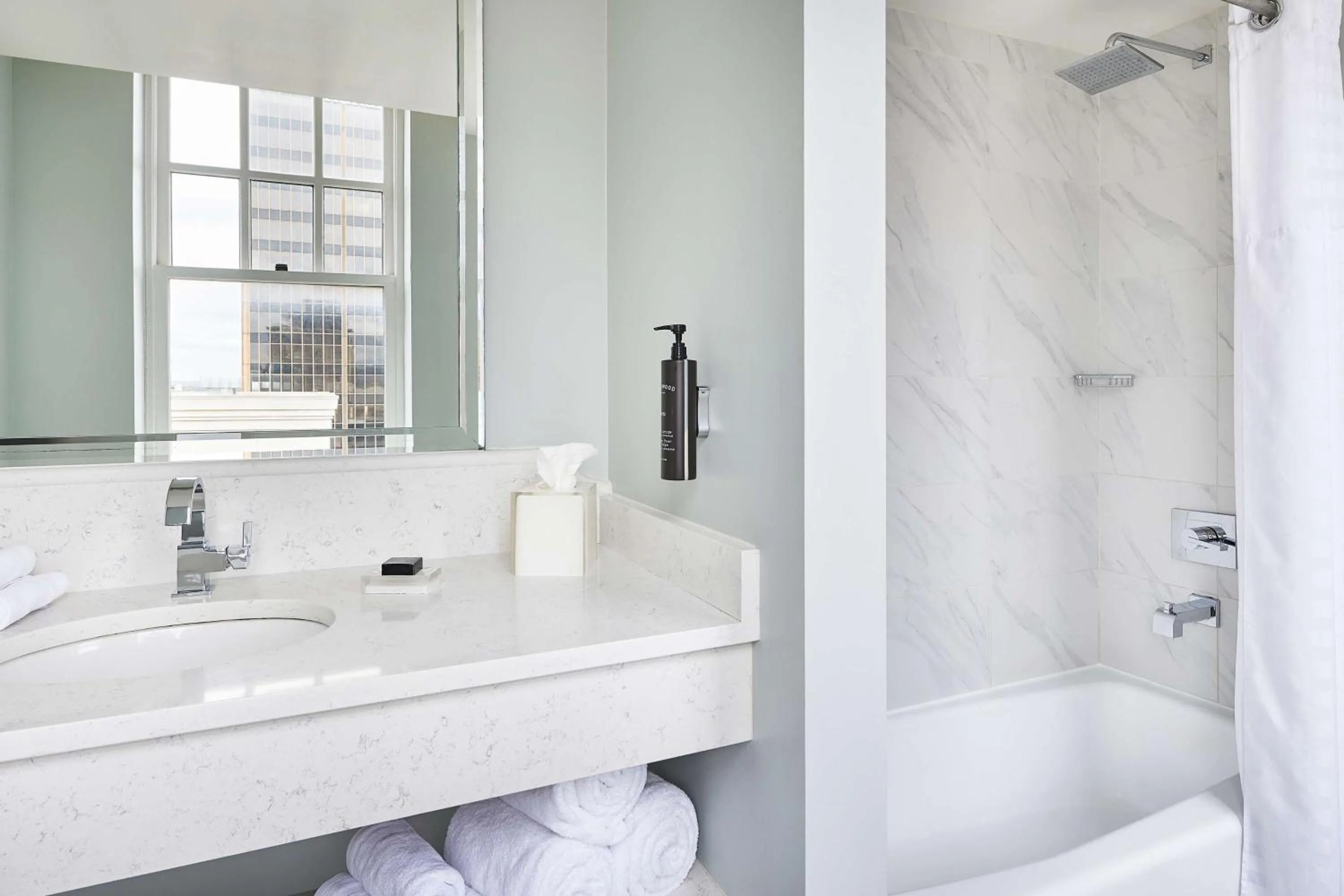 Bathroom in Redmont Hotel Birmingham - Curio Collection by Hilton