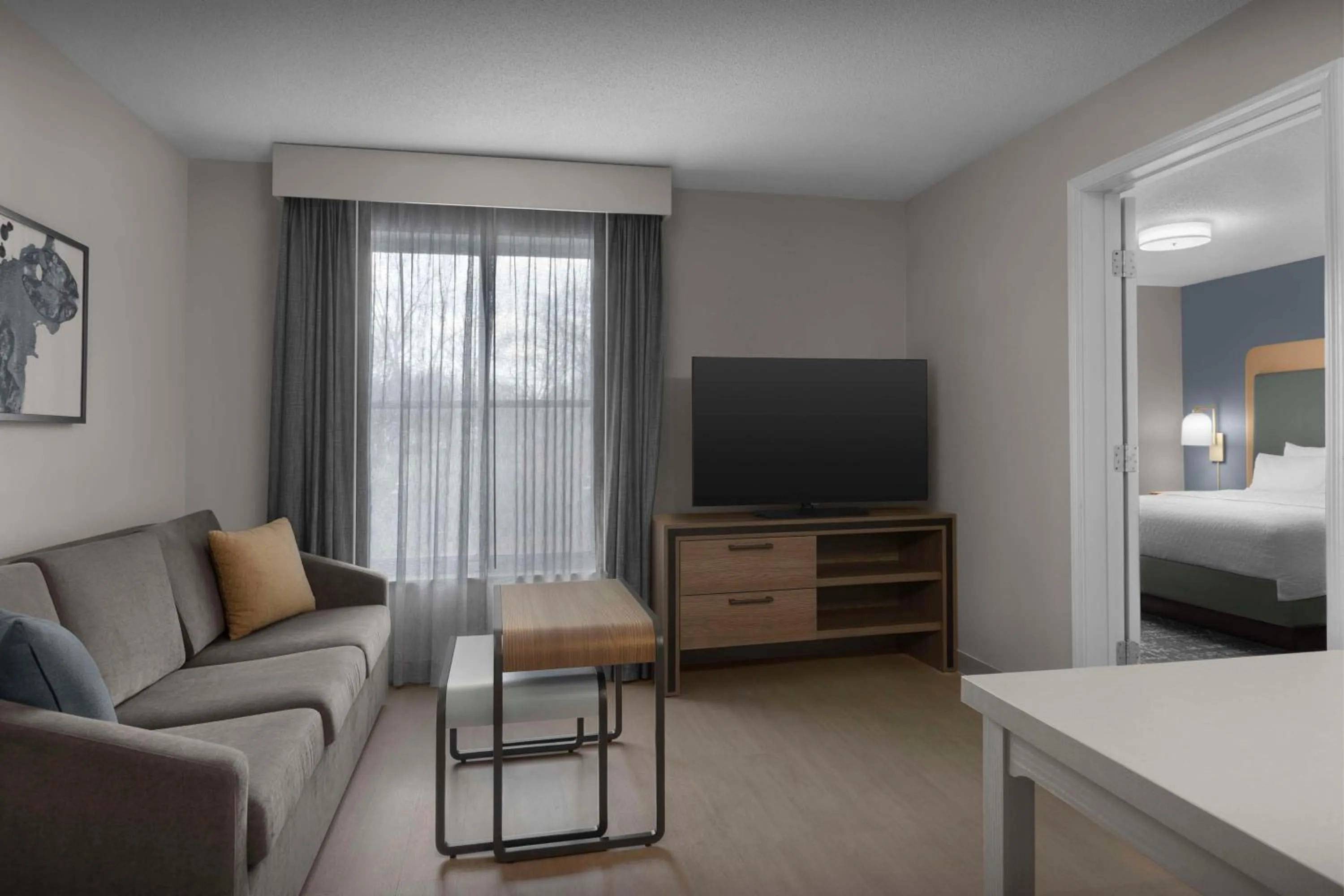 Living room, Bed in Homewood Suites Nashville Airport