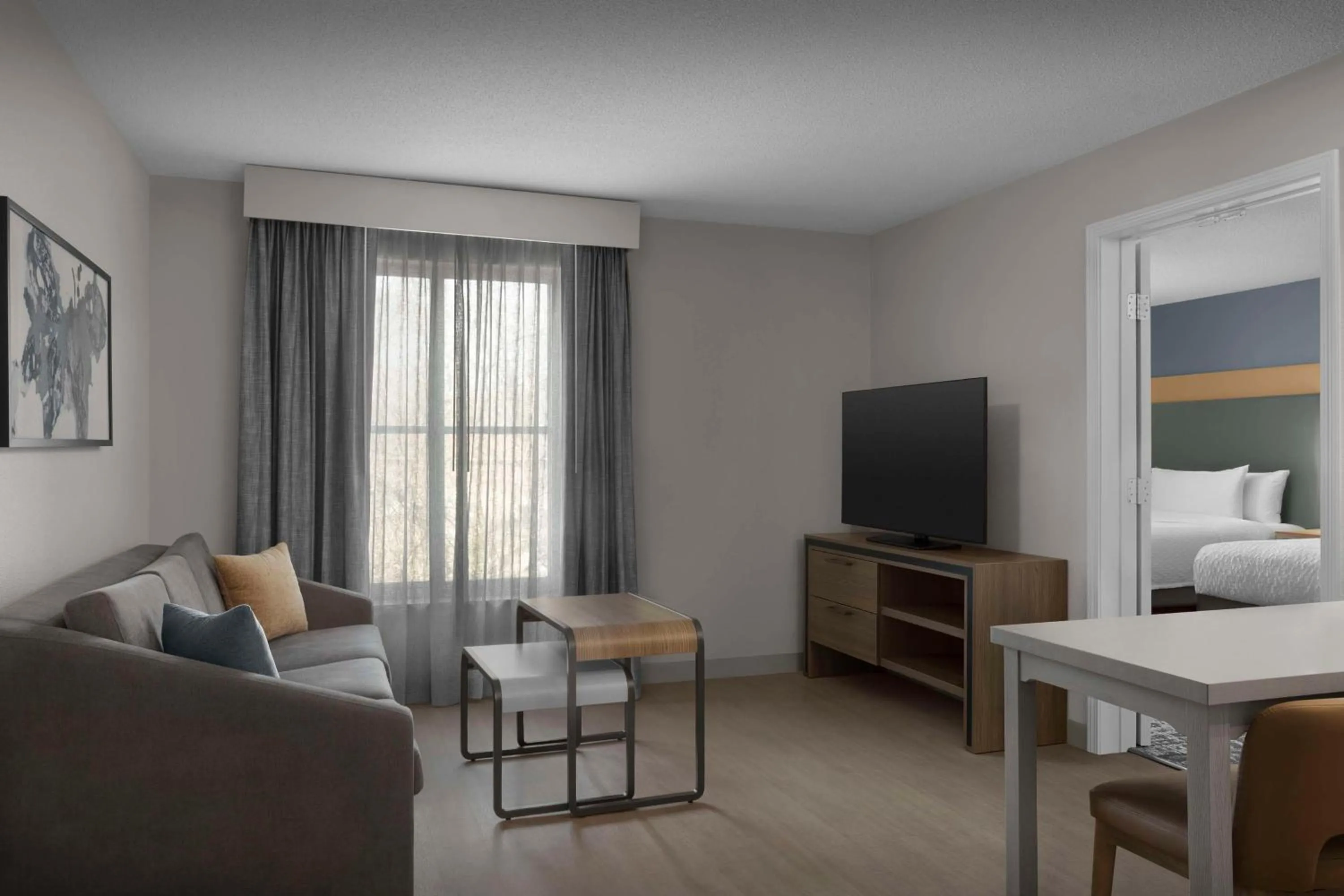 Living room, Bed in Homewood Suites Nashville Airport