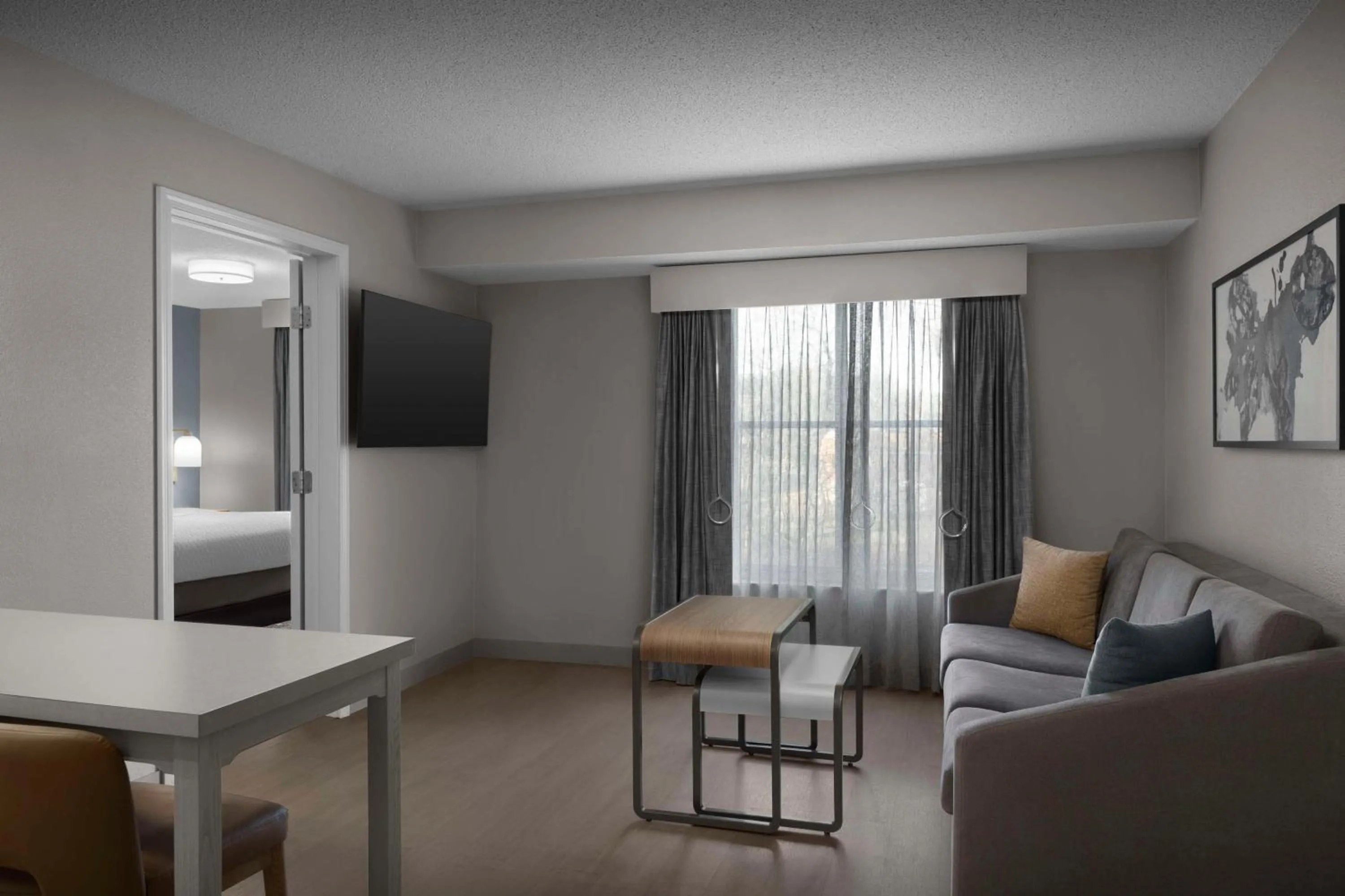 Living room, Bed in Homewood Suites Nashville Airport