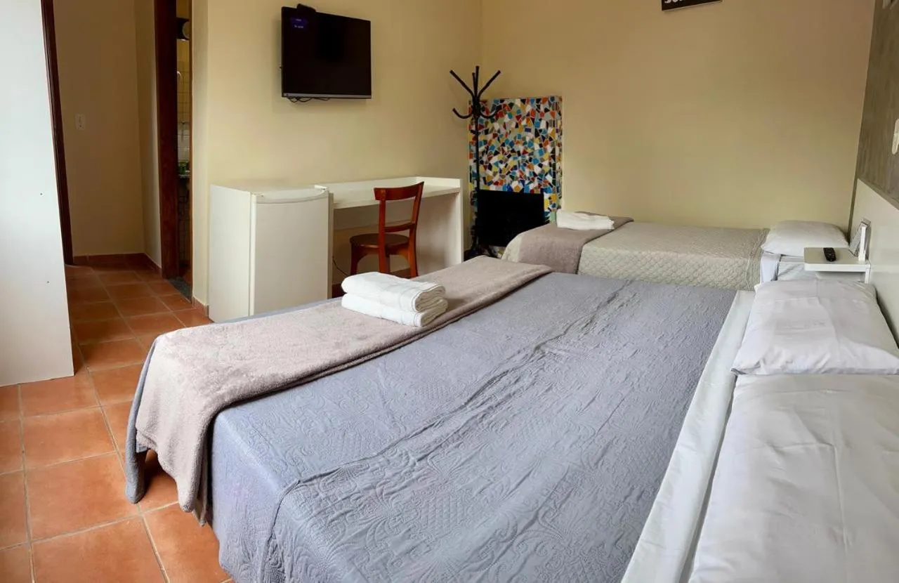 Bed in Pousada Suarez