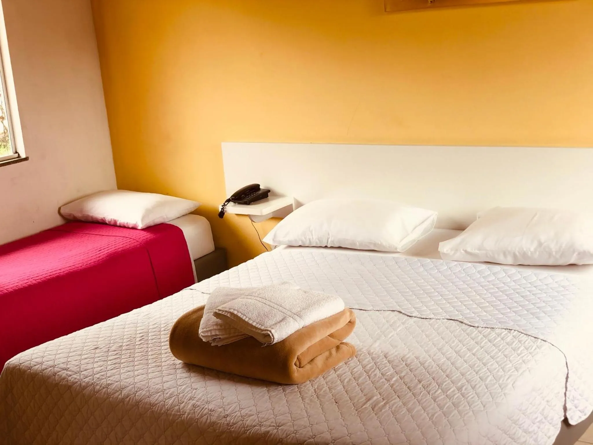 Bed in Pousada Suarez