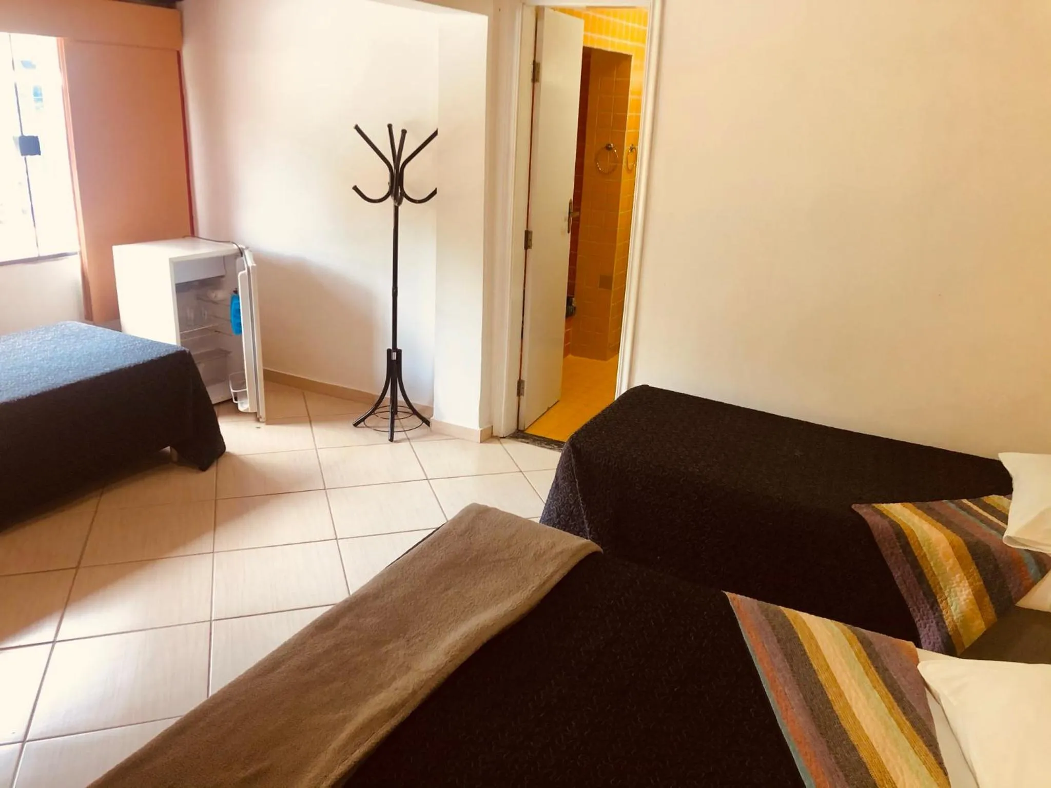 Bed in Pousada Suarez