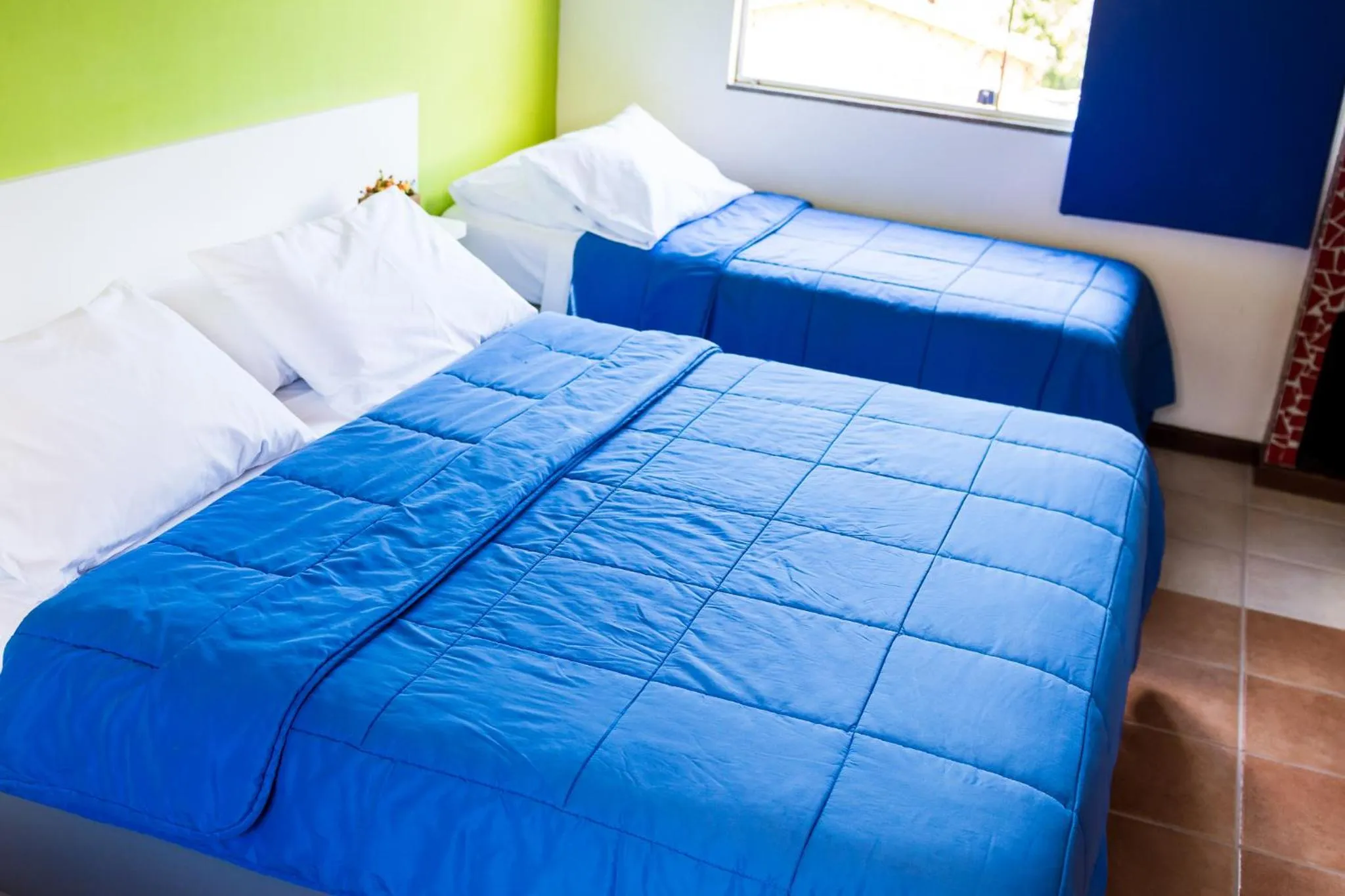 Bed in Pousada Suarez