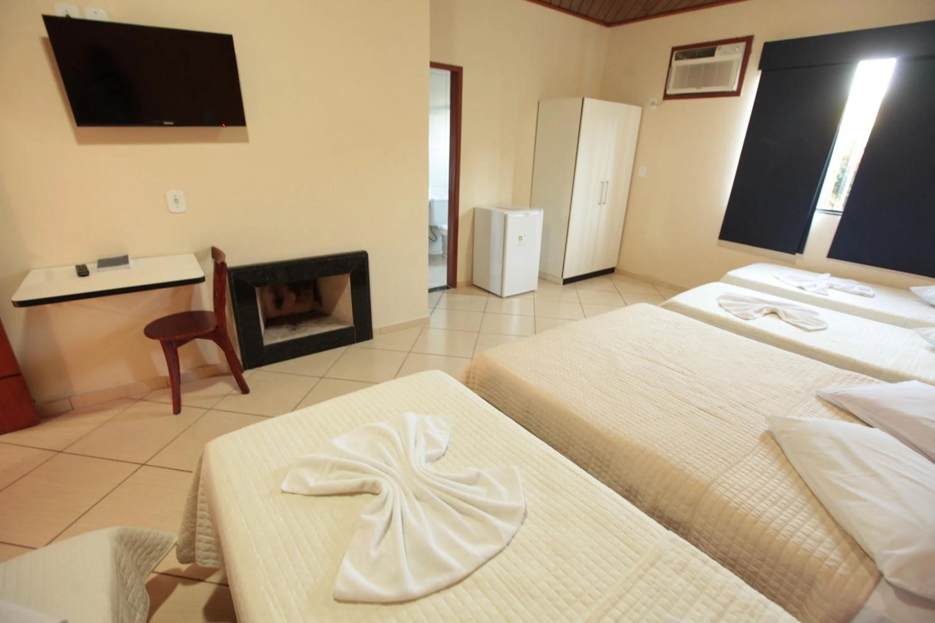 Bed in Pousada Suarez