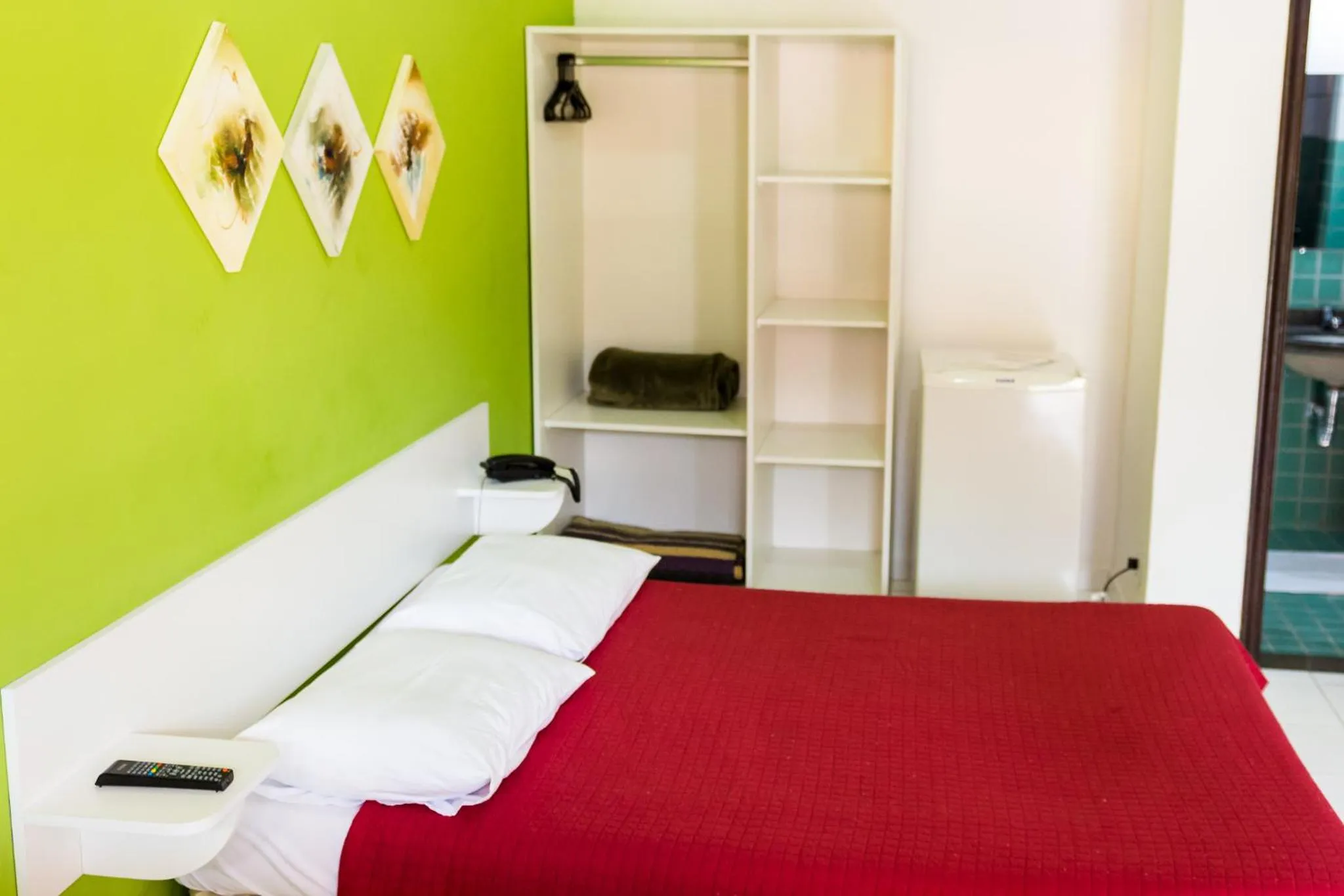 Bed in Pousada Suarez