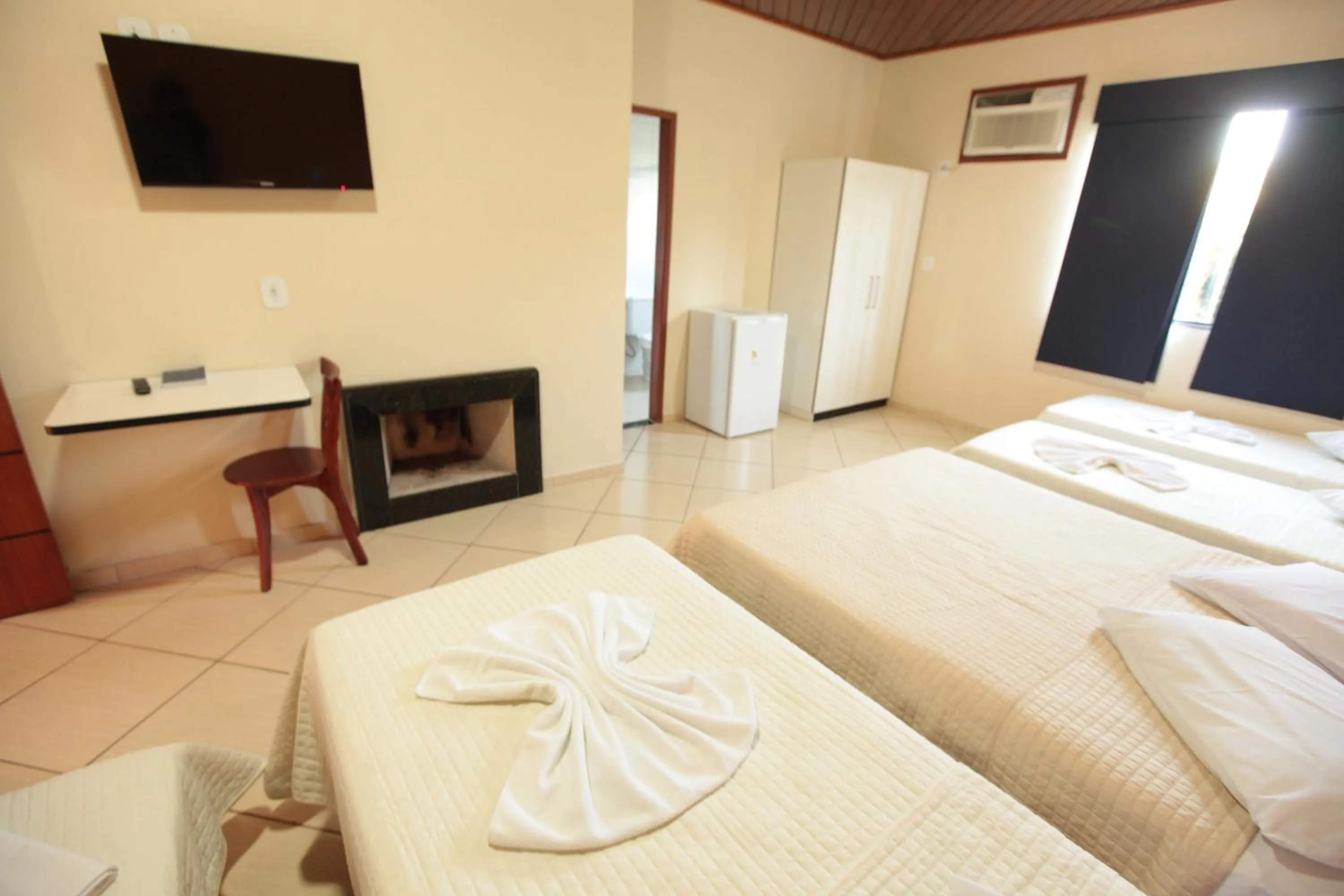 Bed in Pousada Suarez