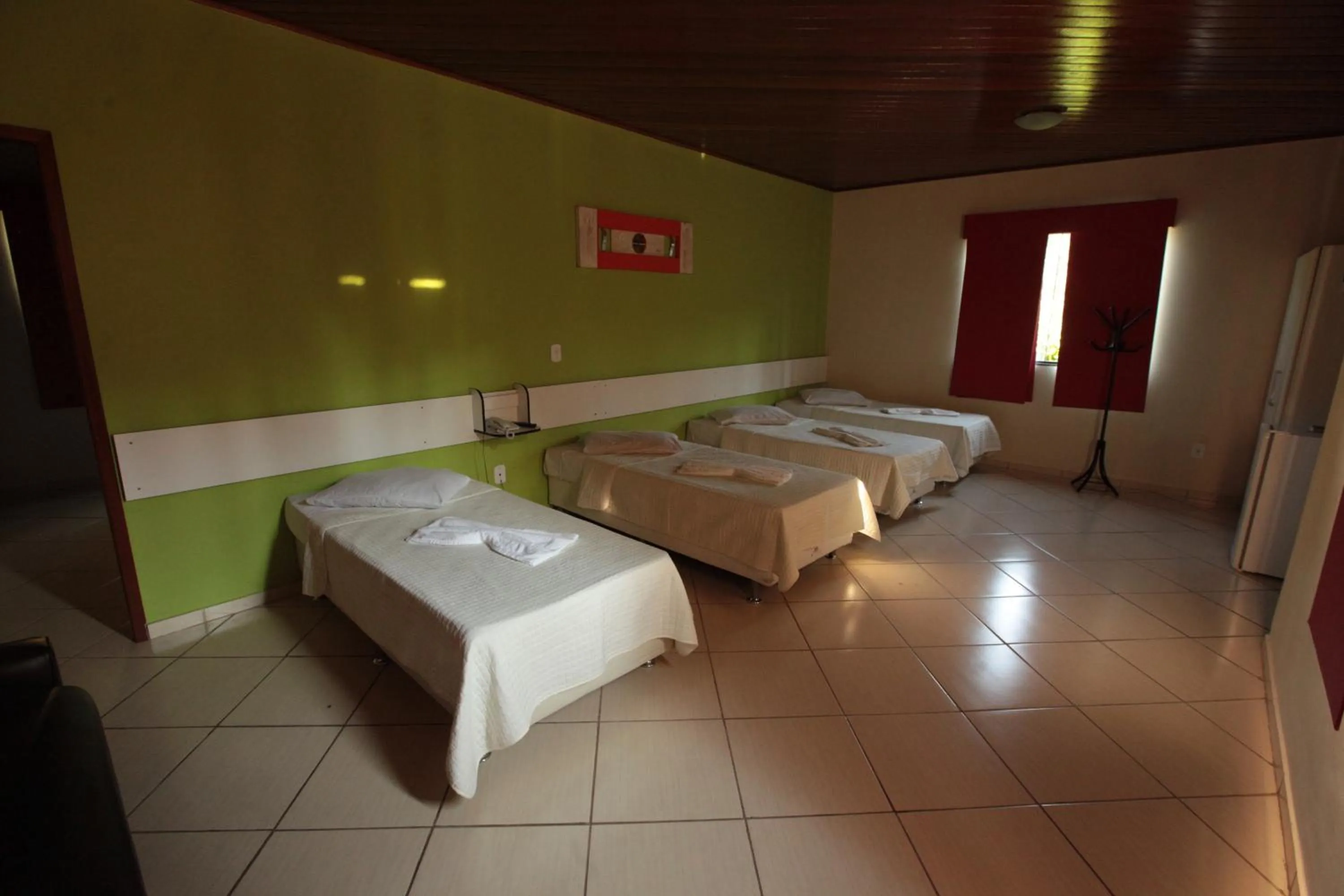 Bed in Pousada Suarez