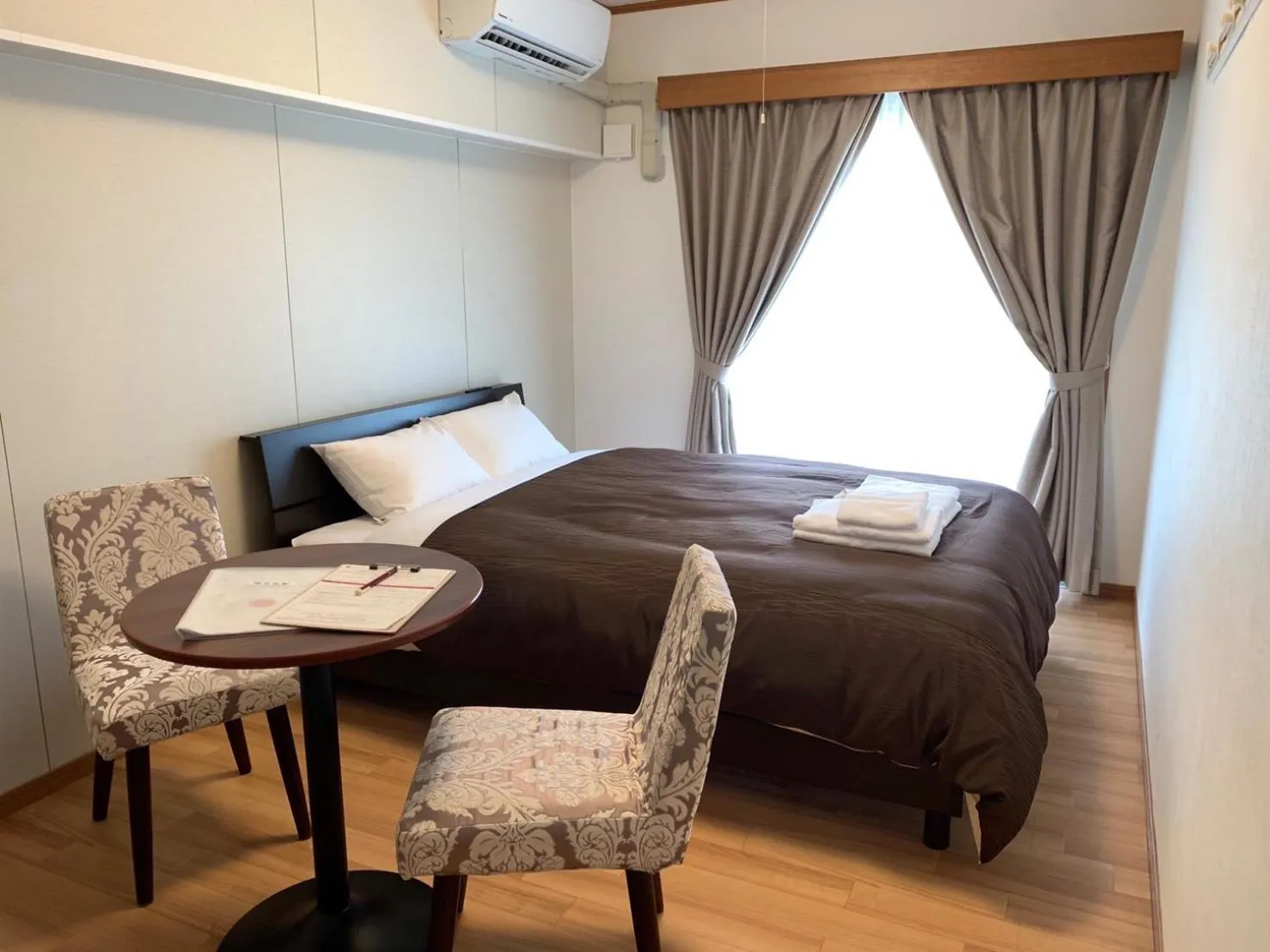Bed in Y' RISE TO HOTEL Miyakojima