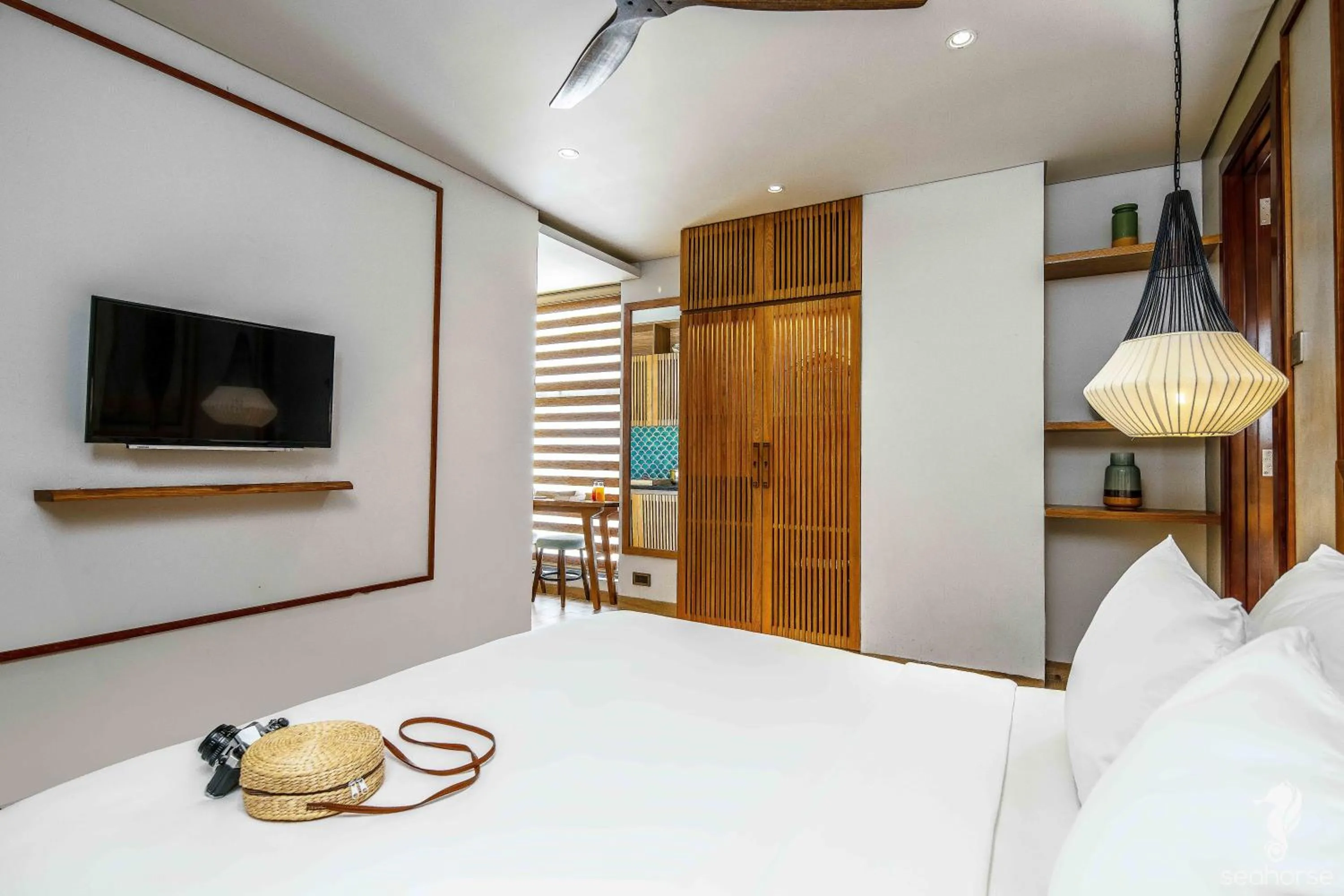 TV and multimedia, Bed in Seahorse Han Market Da Nang Apartment by Haviland