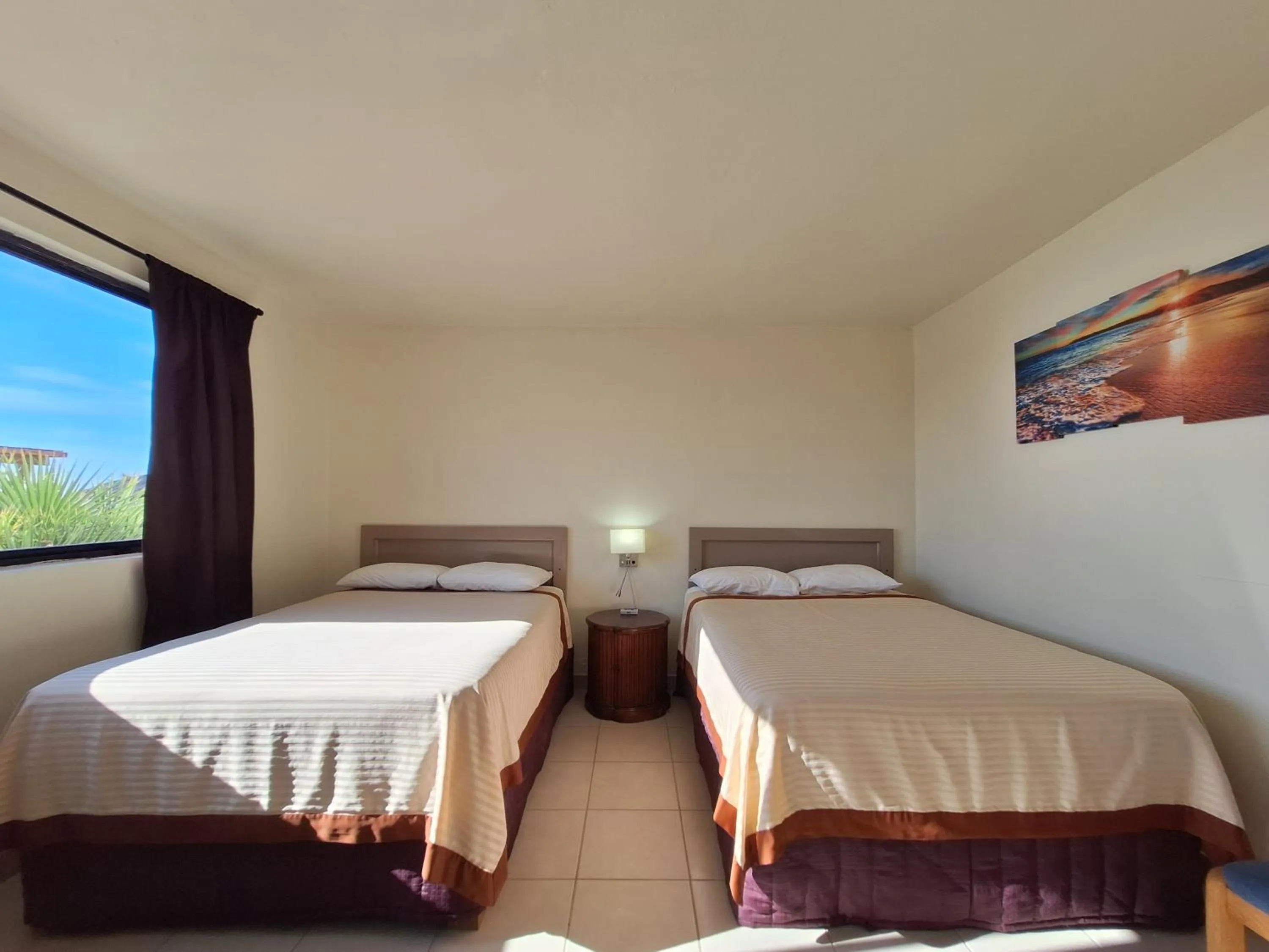 Bed in #33 Bungalow Seaside Hotel & Victors RV Park