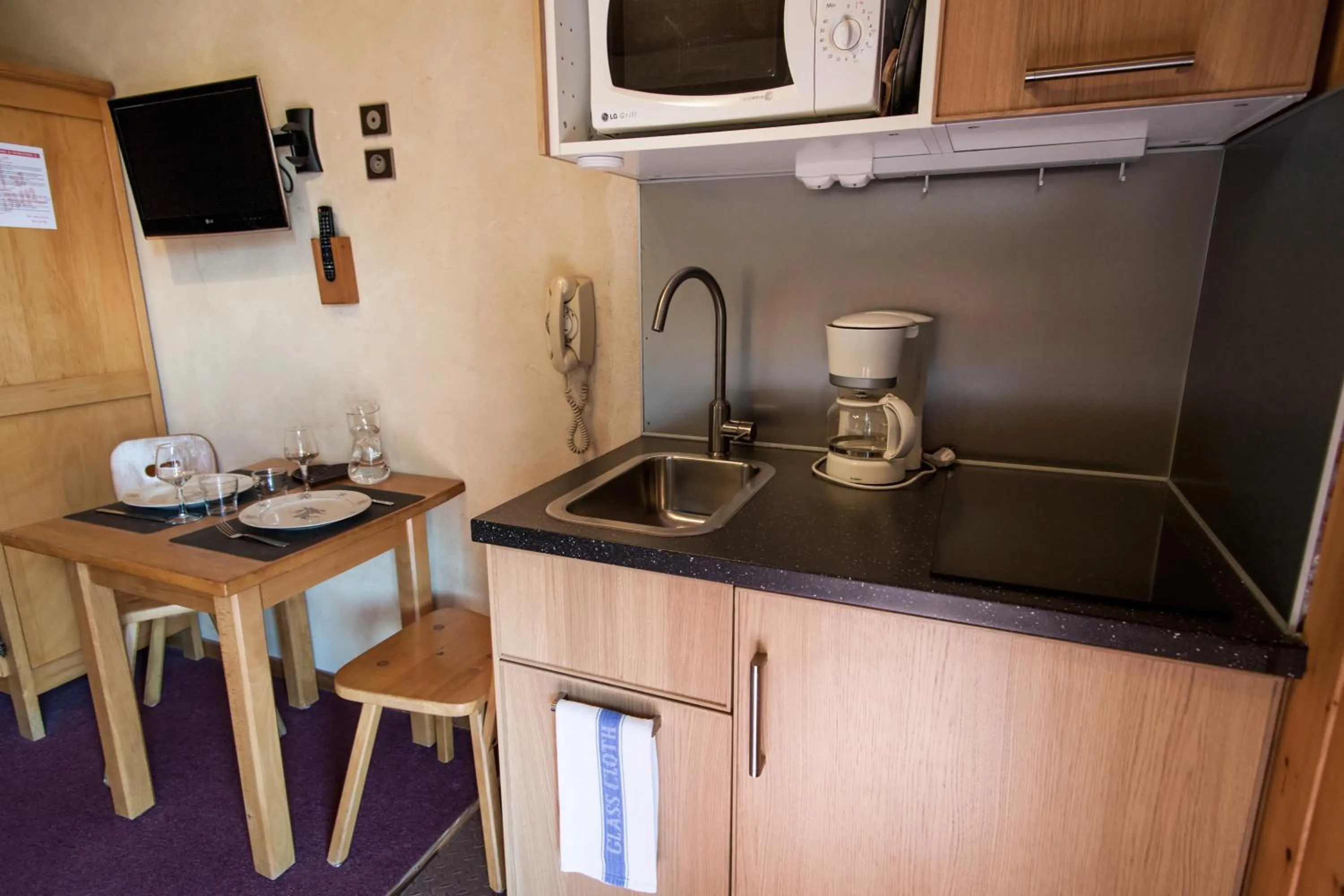 Kitchen or kitchenette in Résidence La Cour