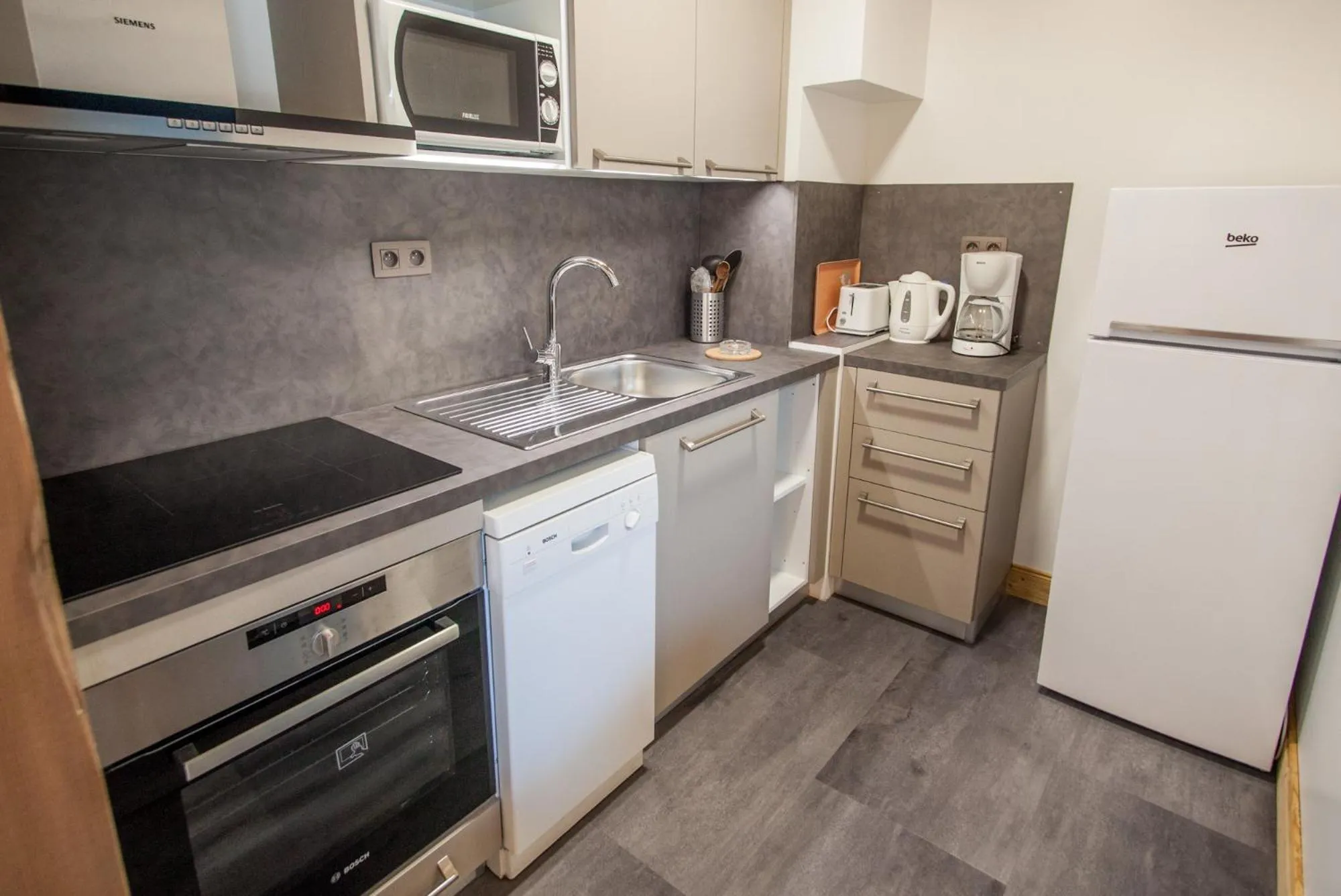 Kitchen or kitchenette in Appartements Giffre et Clesson - DAHU COMPAGNIE