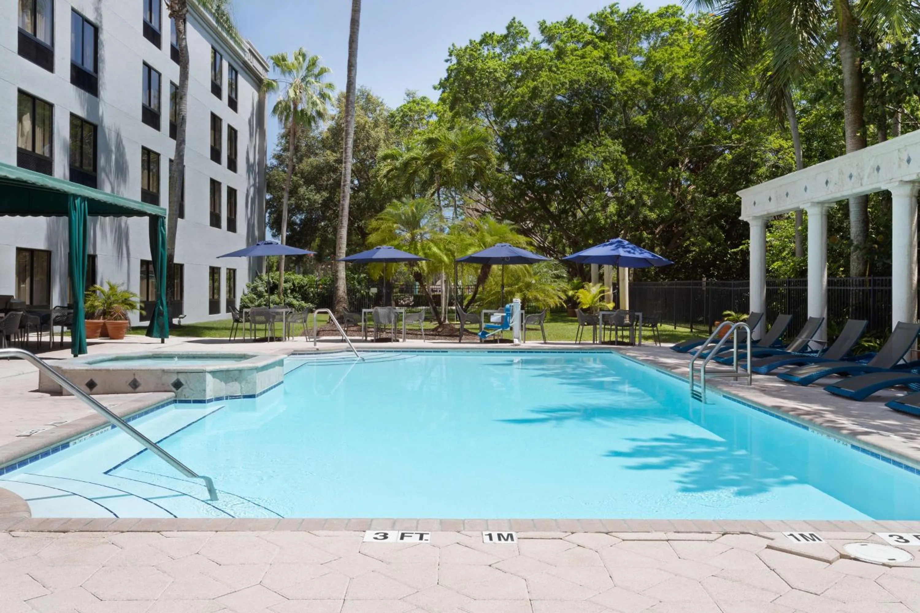 Pool view in Hampton Inn & Suites Boynton Beach