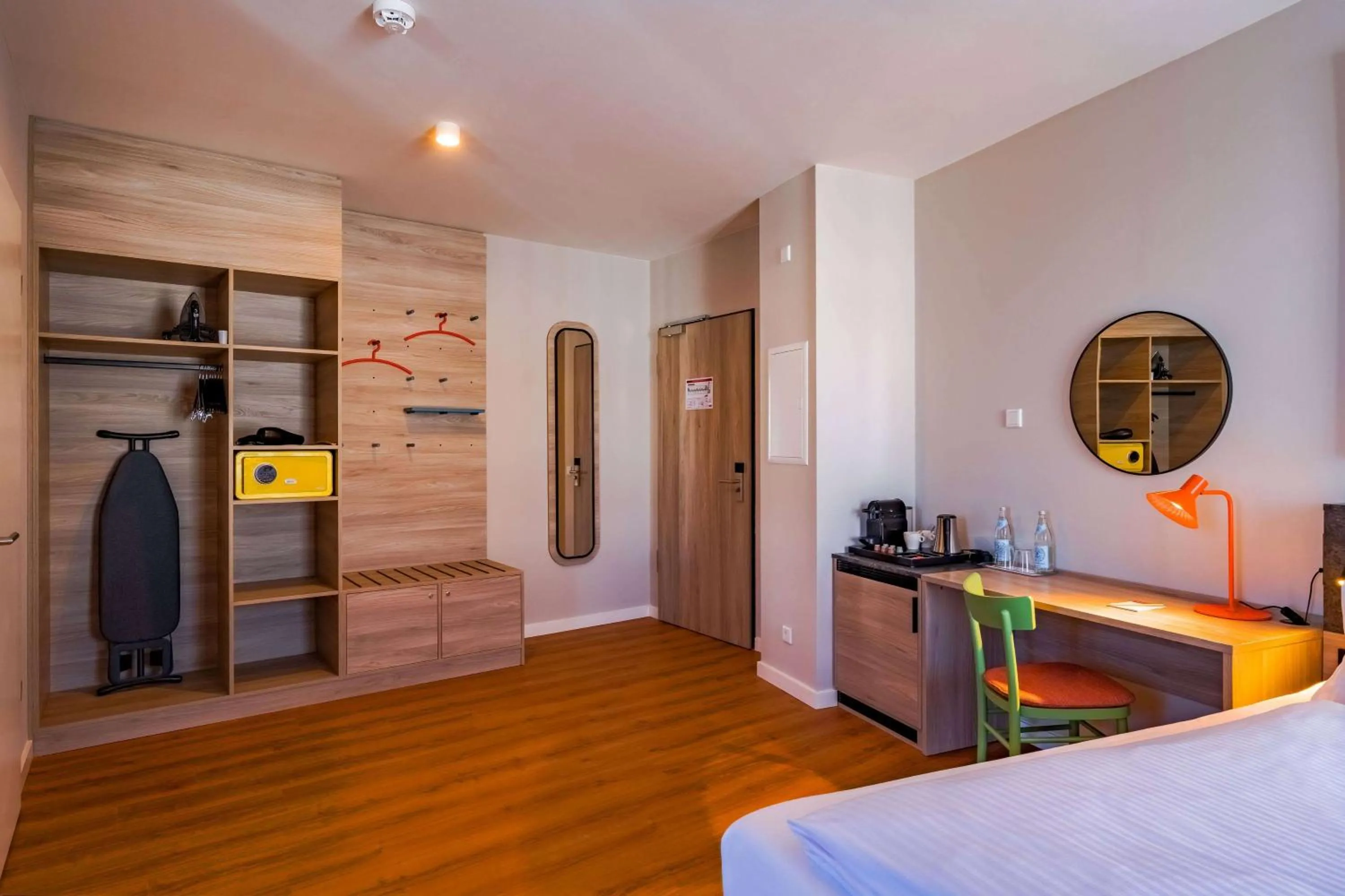 Photo of the whole room, Bed in Ramada Encore by Wyndham Munich Messe