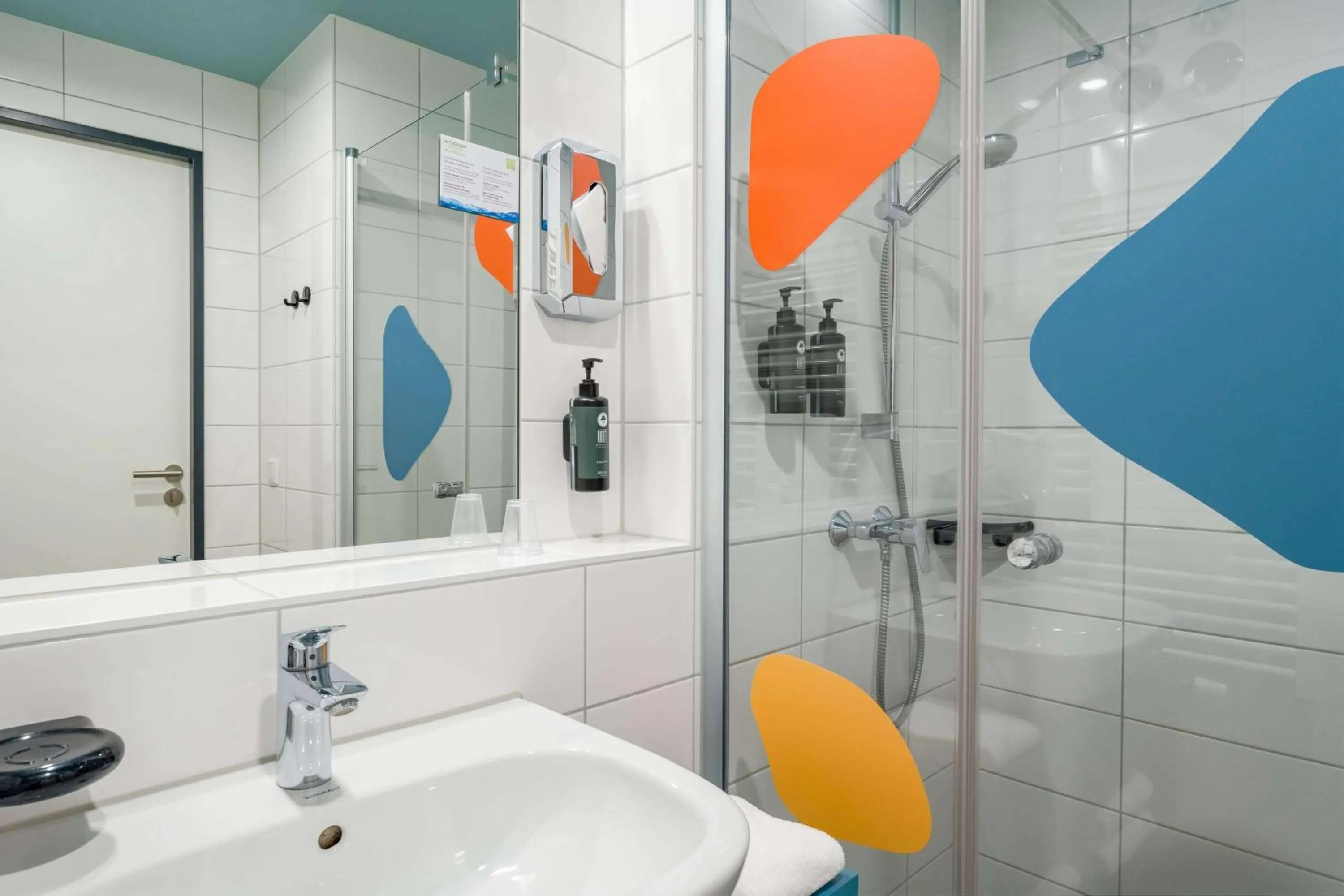 Photo of the whole room in Ramada Encore by Wyndham Munich Messe