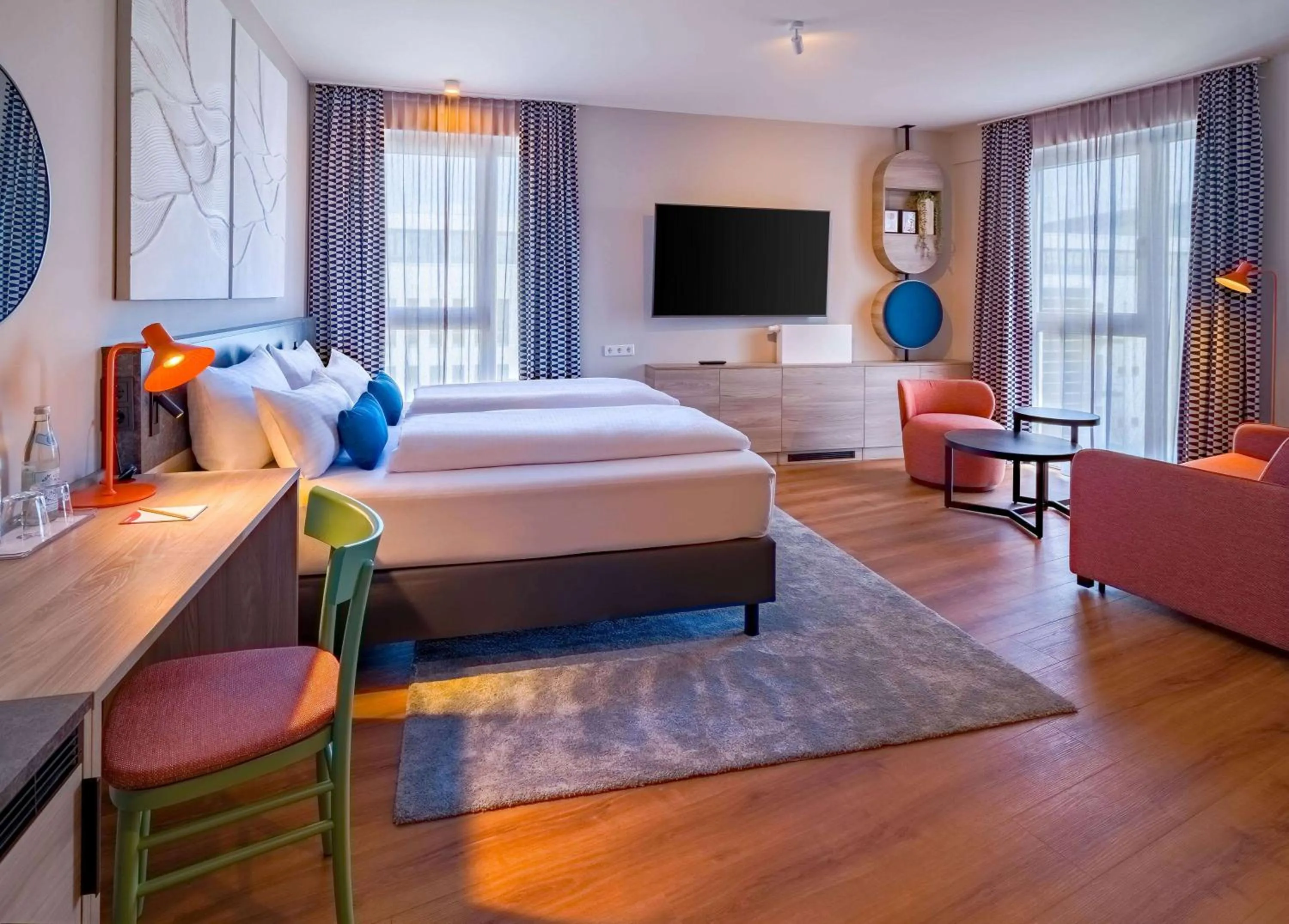 Photo of the whole room, Bed in Ramada Encore by Wyndham Munich Messe