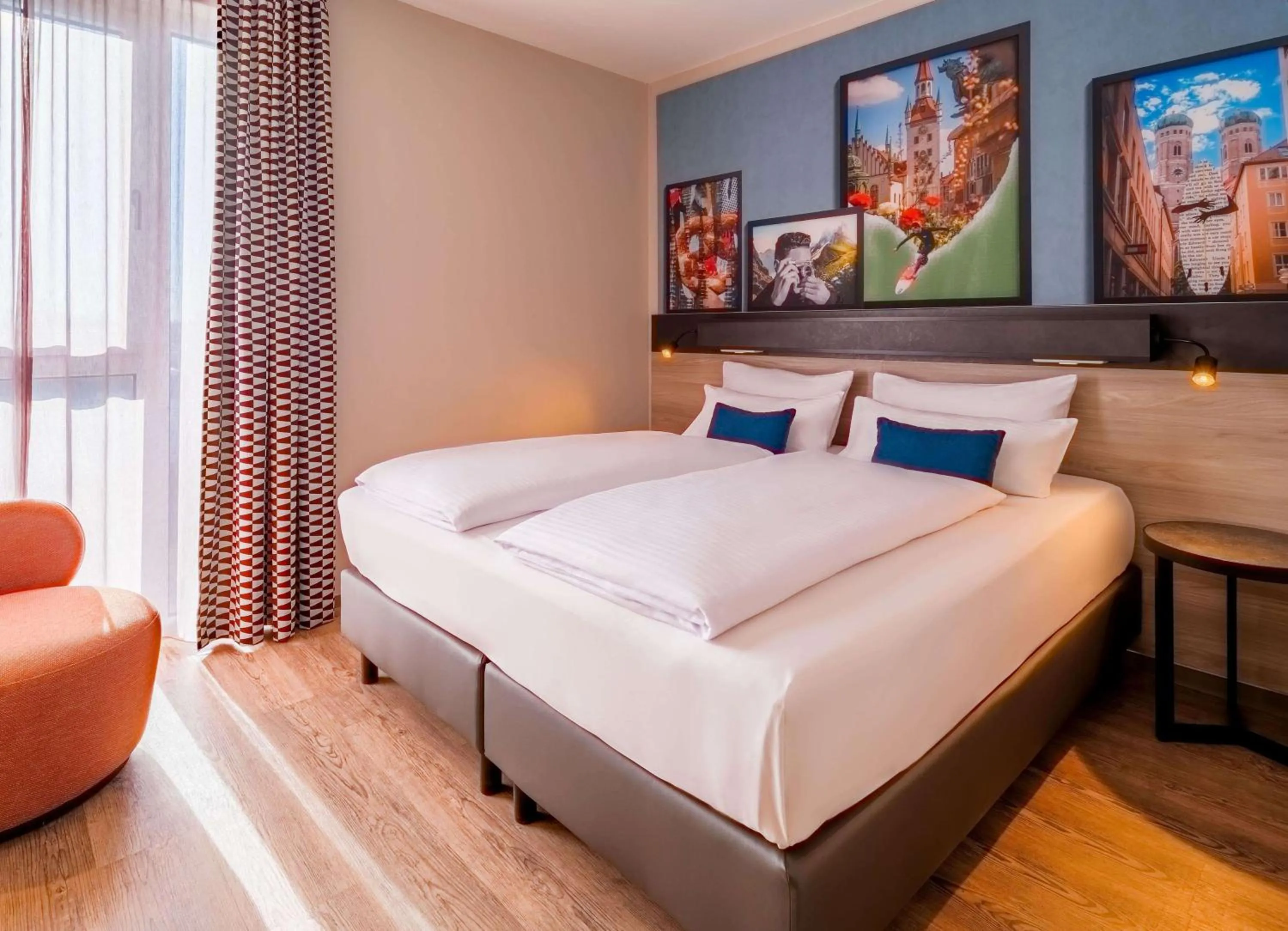 Photo of the whole room, Bed in Ramada Encore by Wyndham Munich Messe