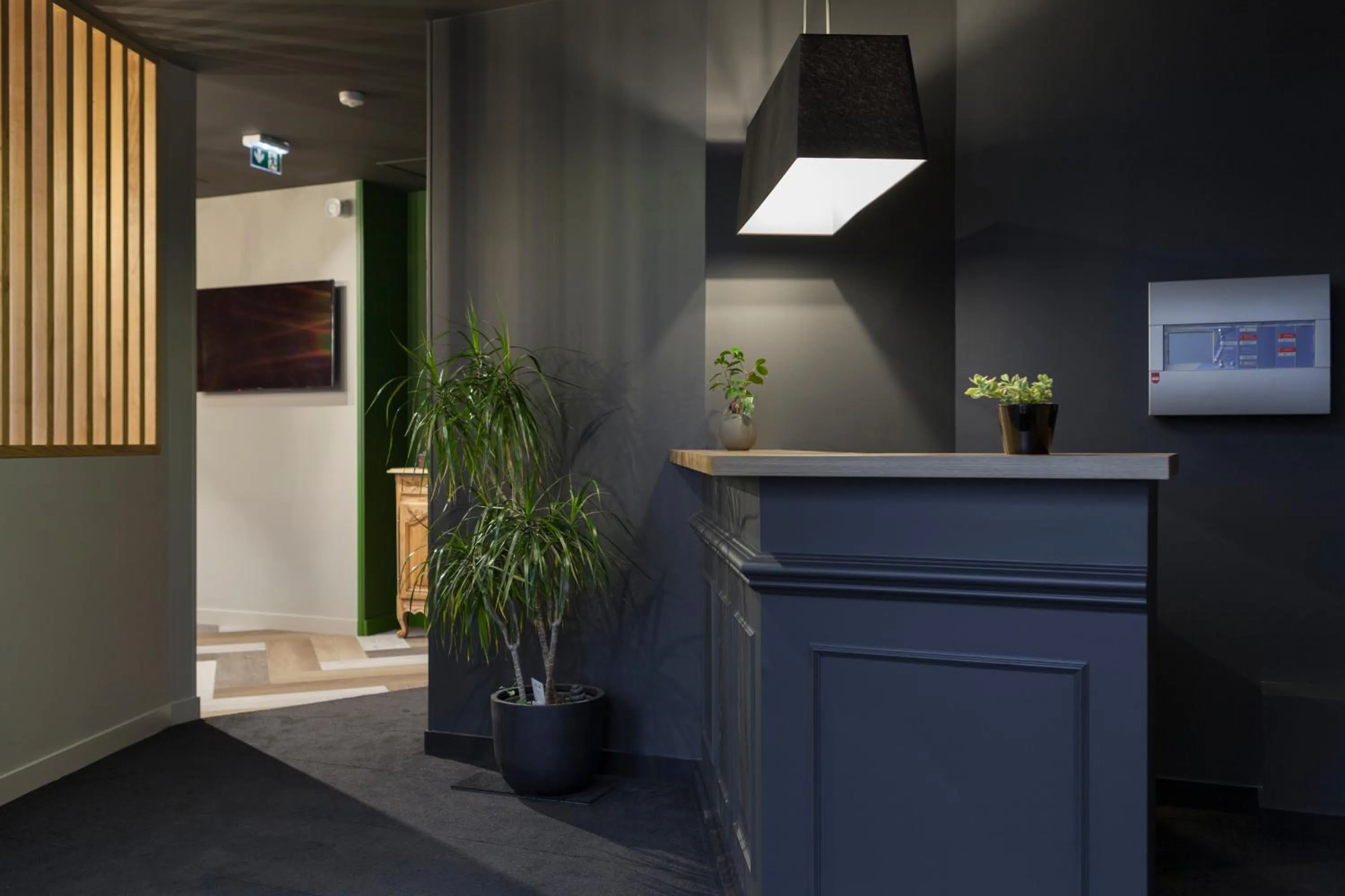 Lobby or reception in Logis Hotel du Maine