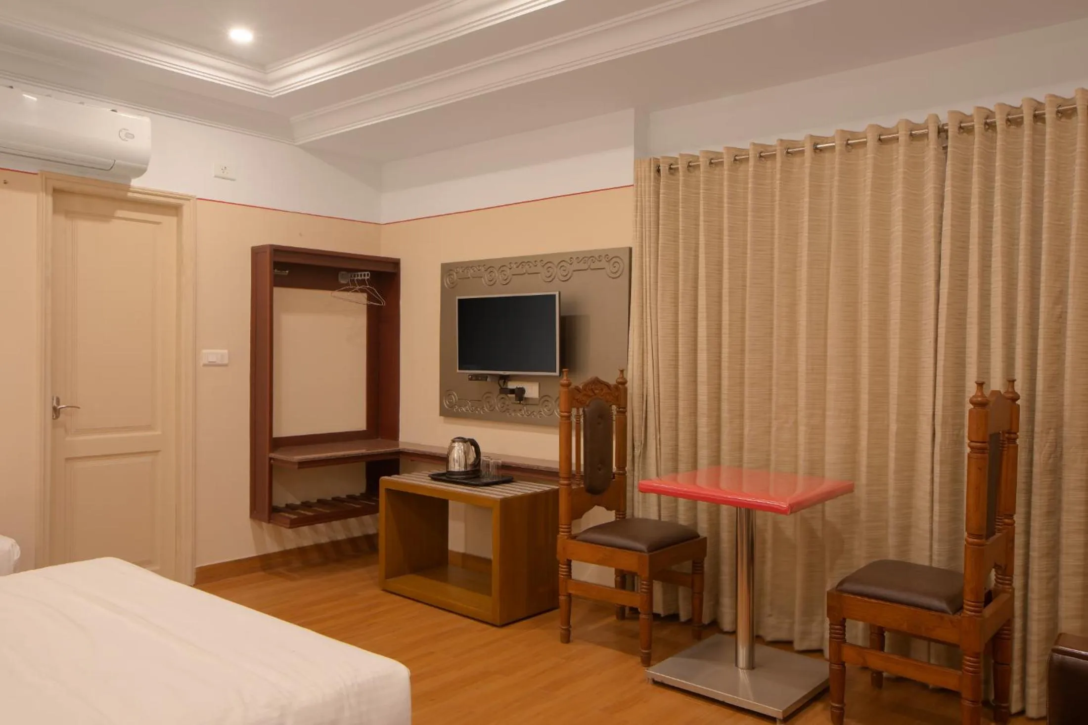 Bed in Hotel Vashanth Krishna