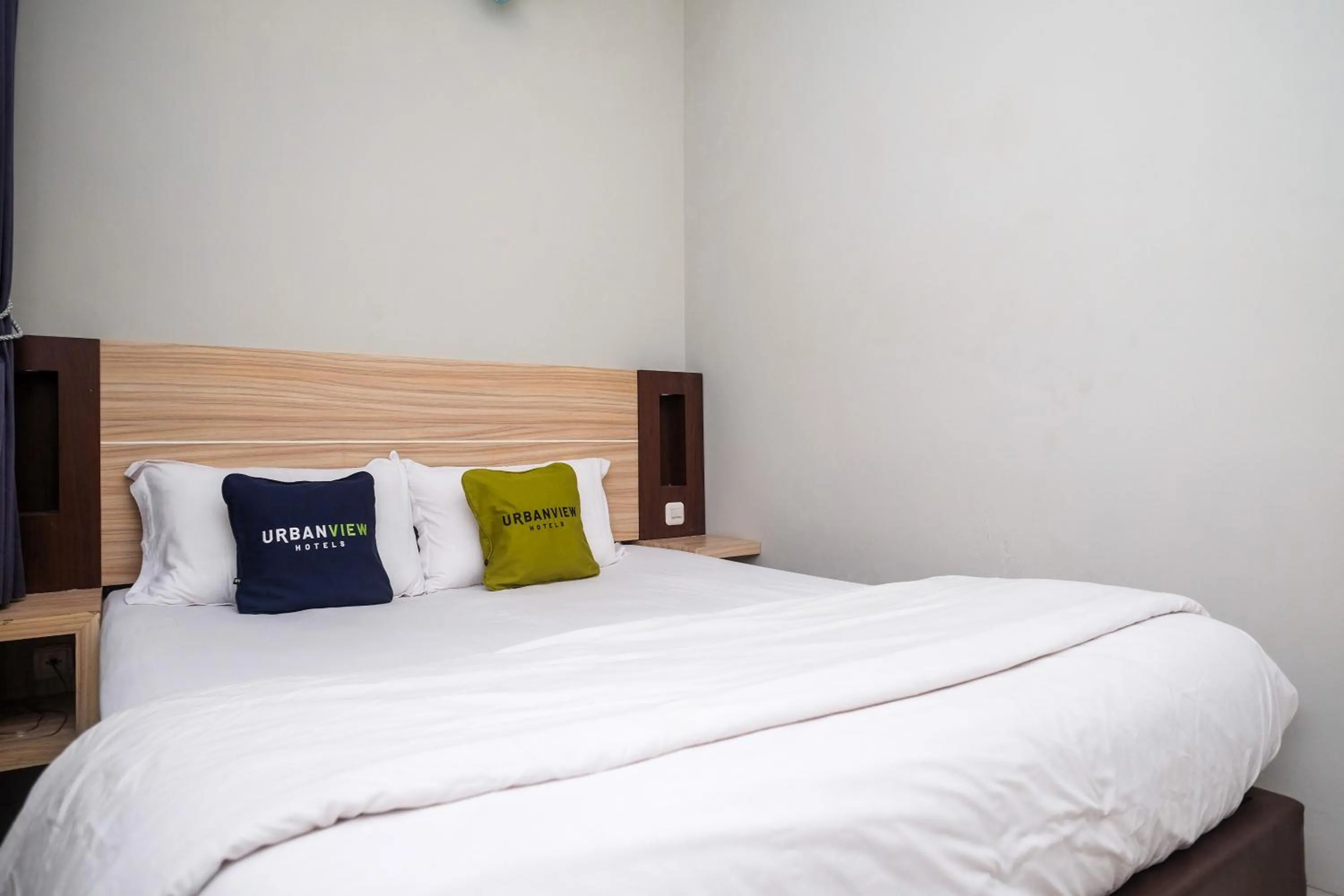 Bed in Urbanview Stay at H jakal by RedDoorz