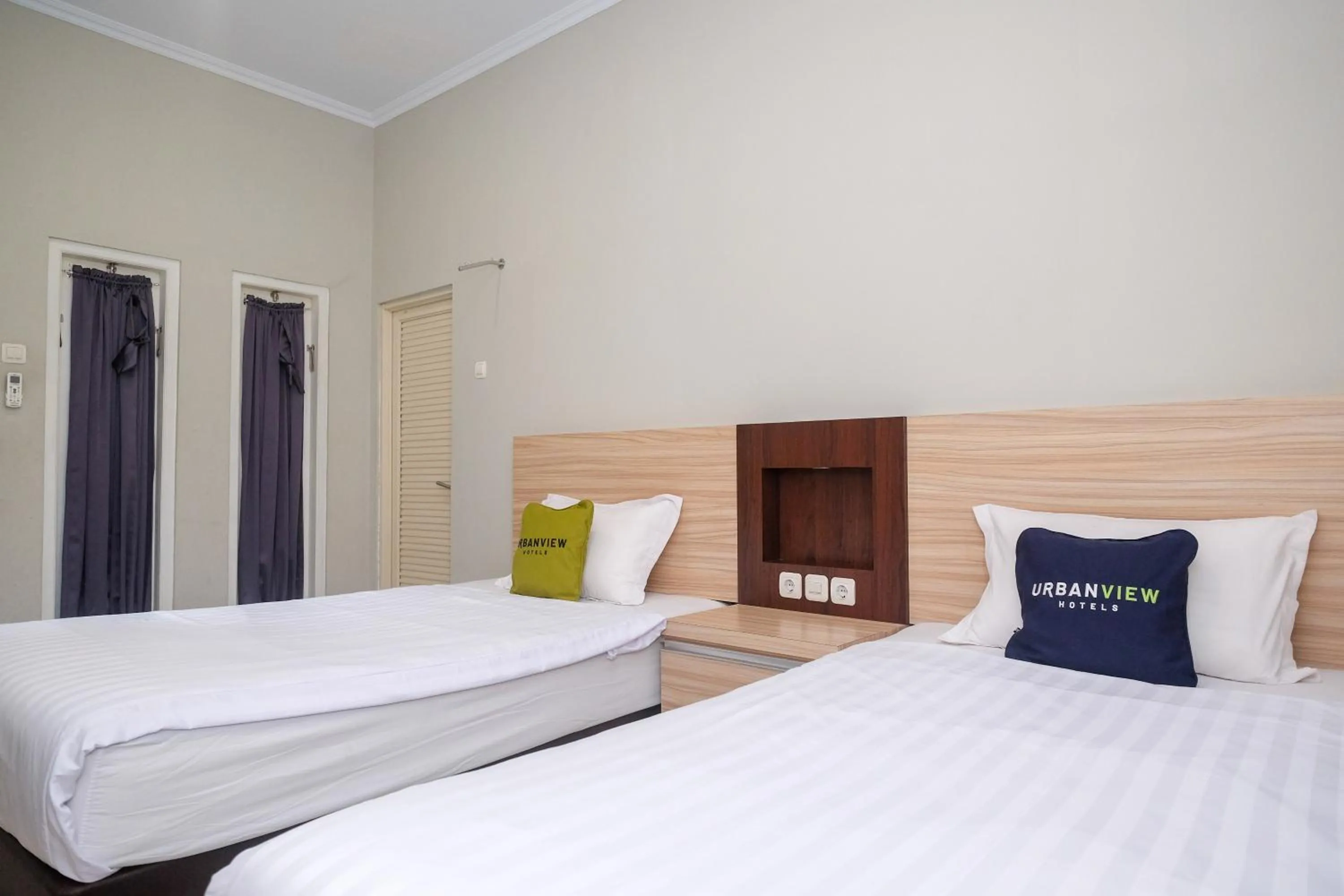 Bed in Urbanview Stay at H jakal by RedDoorz