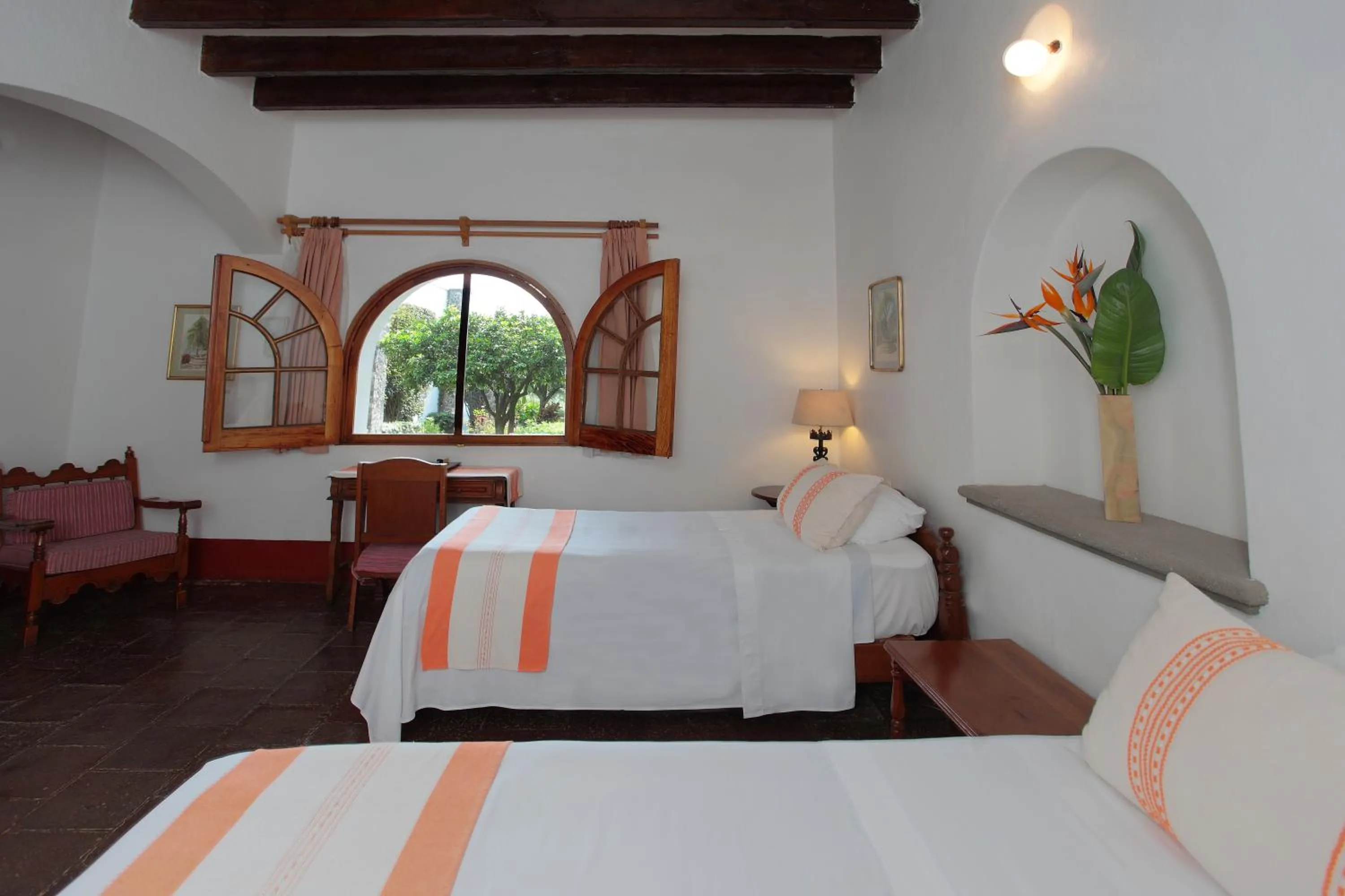 Photo of the whole room, Bed in Posada del Tepozteco - Hotel & Gallery