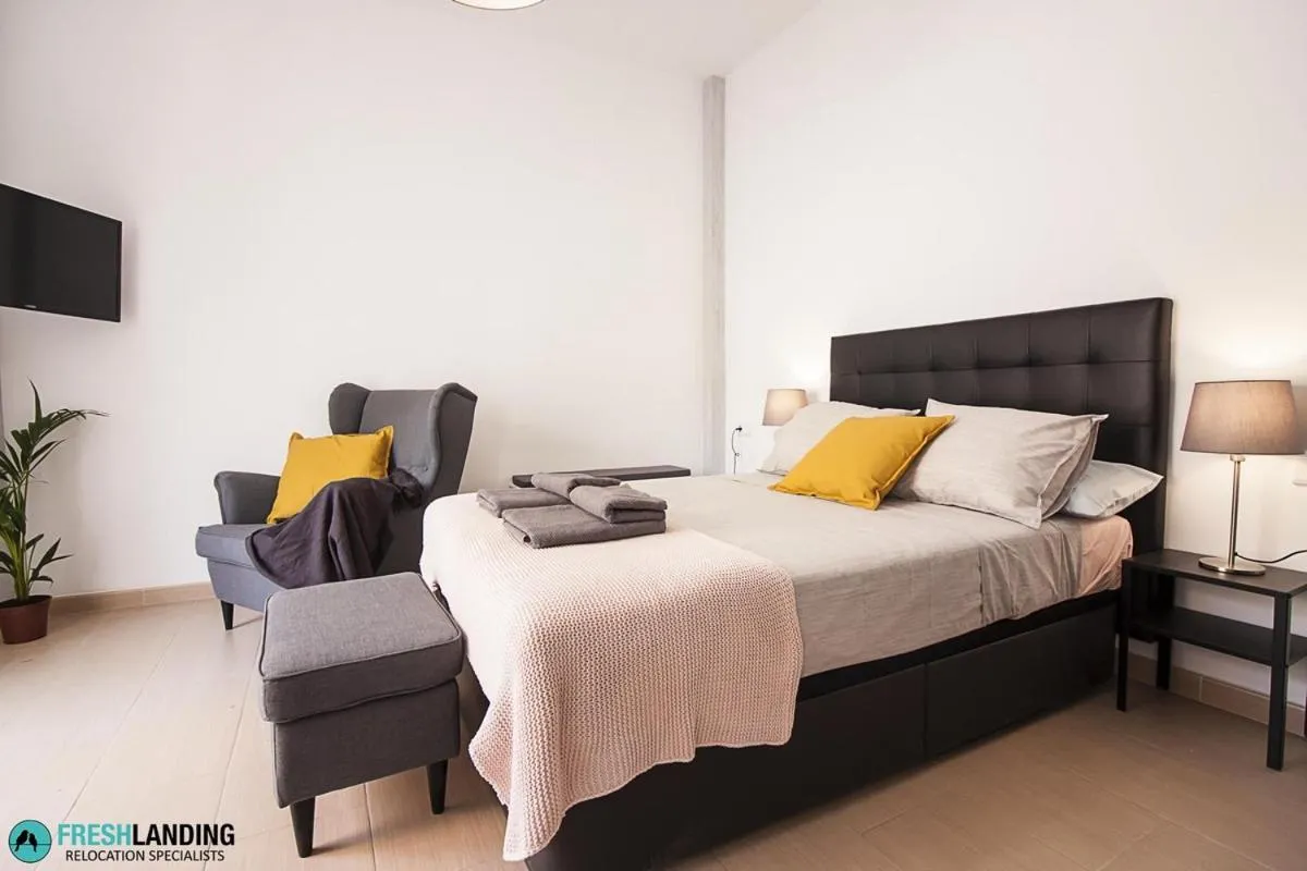 Bedroom, Bed in Rayito by FreshApartments by Bossh! Apartments