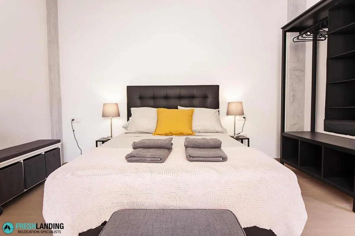 Bedroom, Bed in Rayito by FreshApartments by Bossh! Apartments