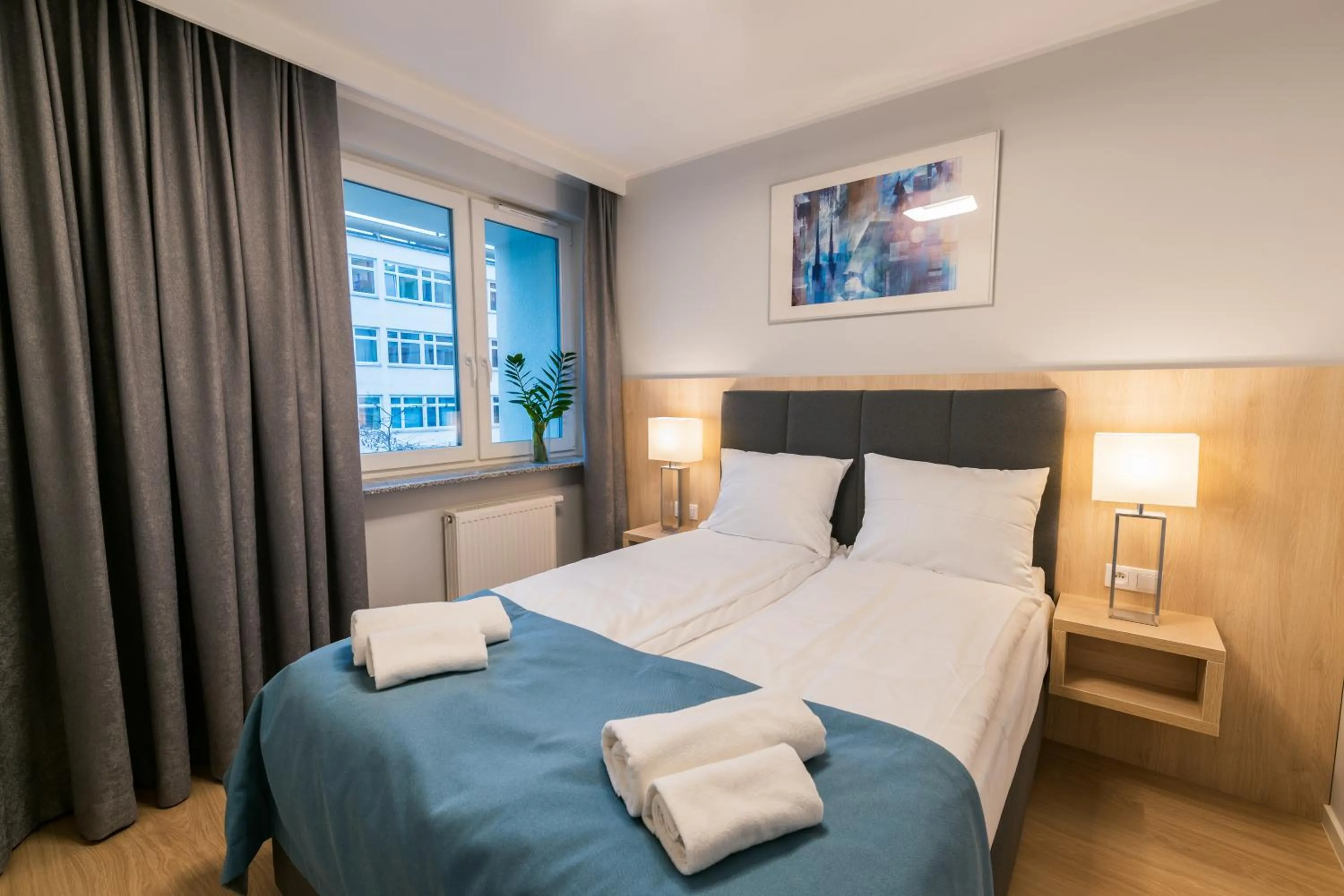 Bed in Q17 Apartments Rynek