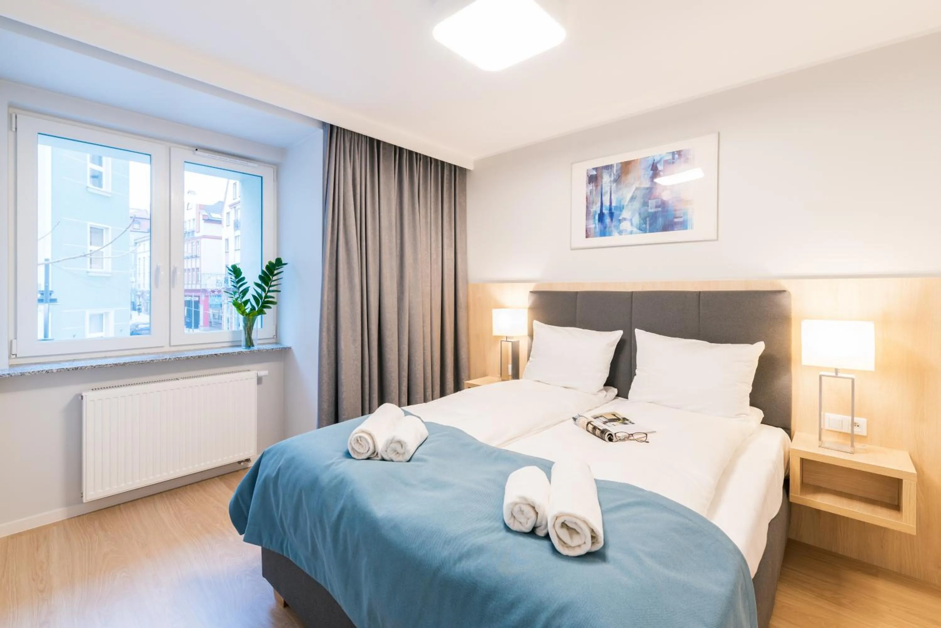 Bed in Q17 Apartments Rynek