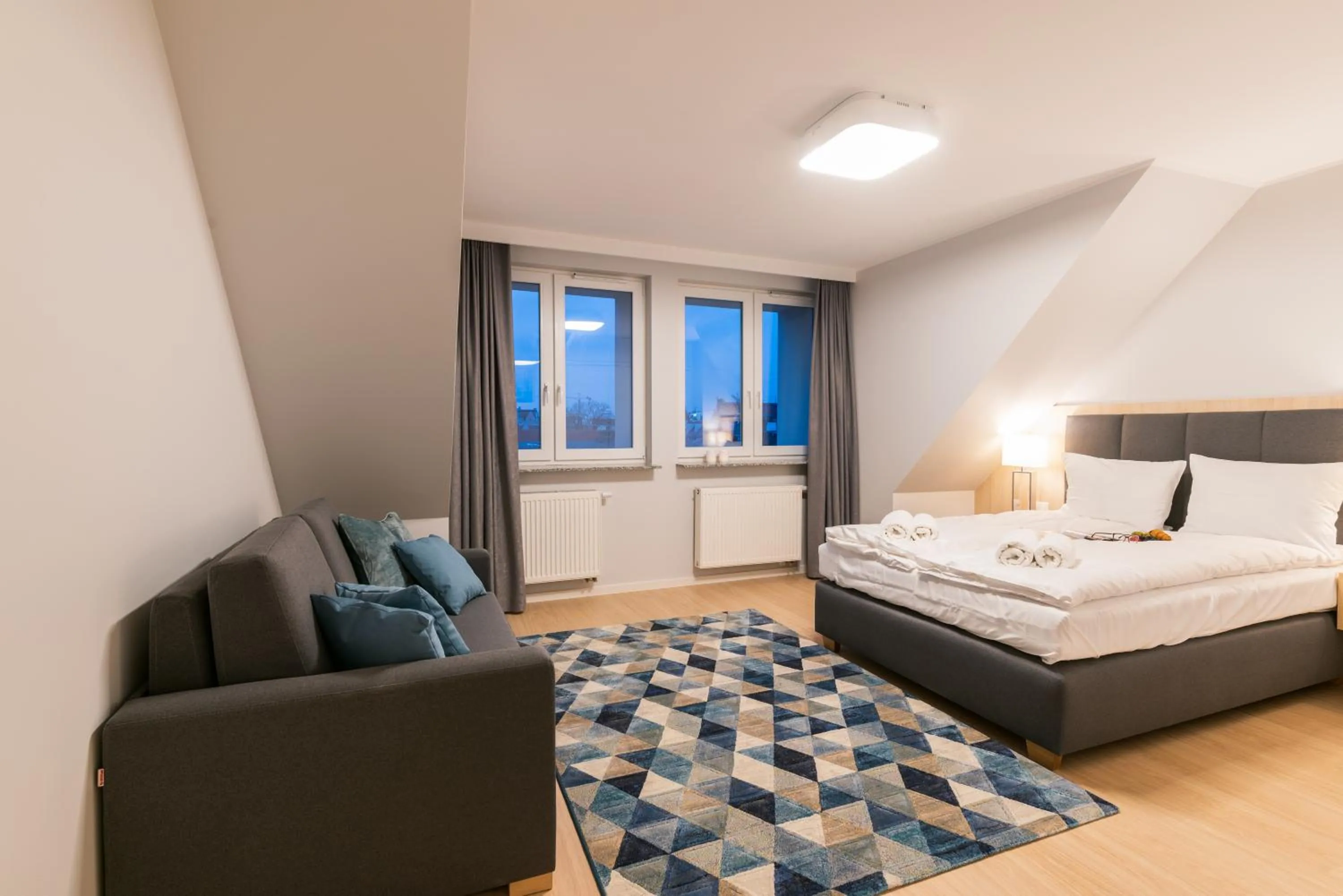 Bed in Q17 Apartments Rynek