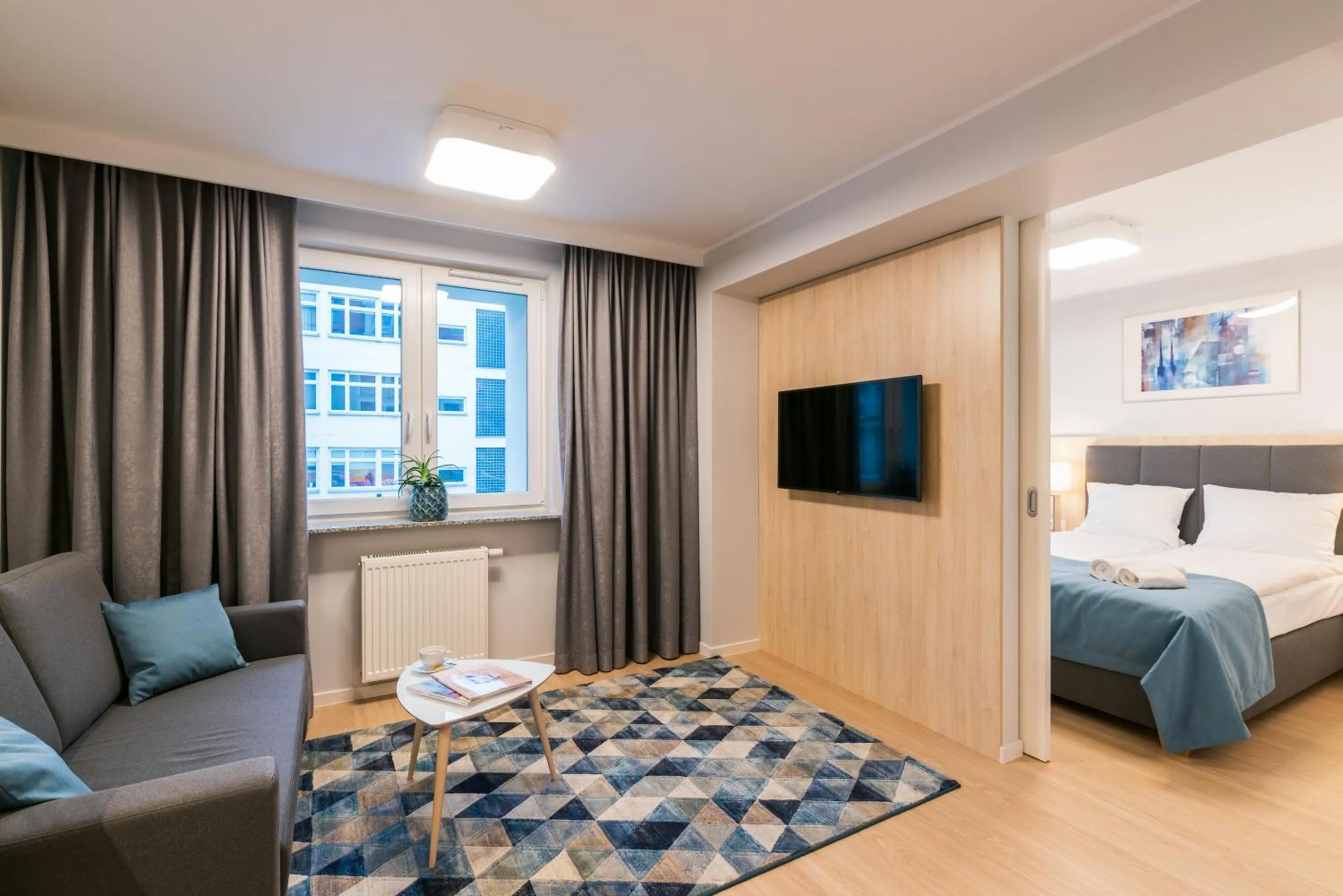 Bed in Q17 Apartments Rynek