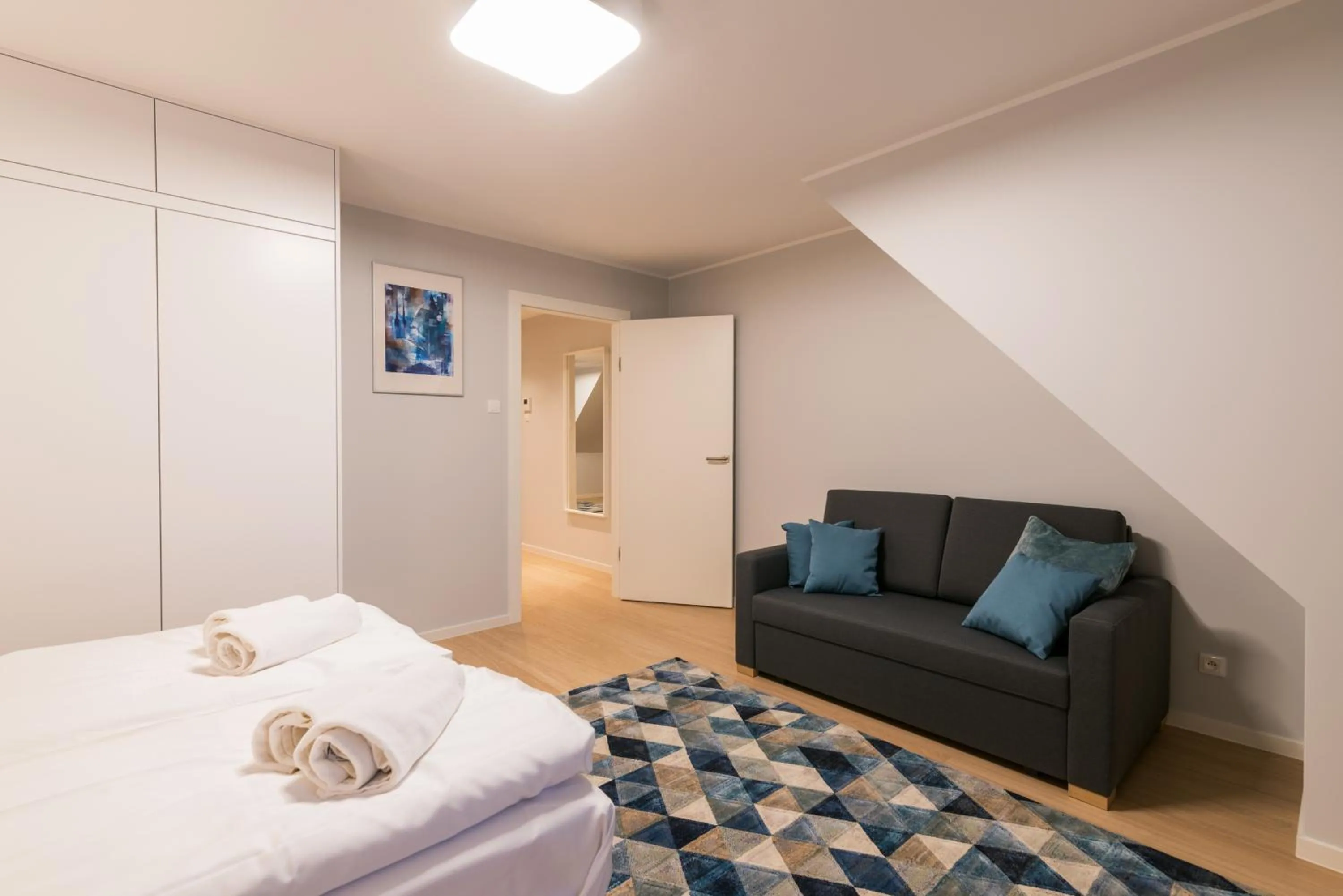 Bed in Q17 Apartments Rynek