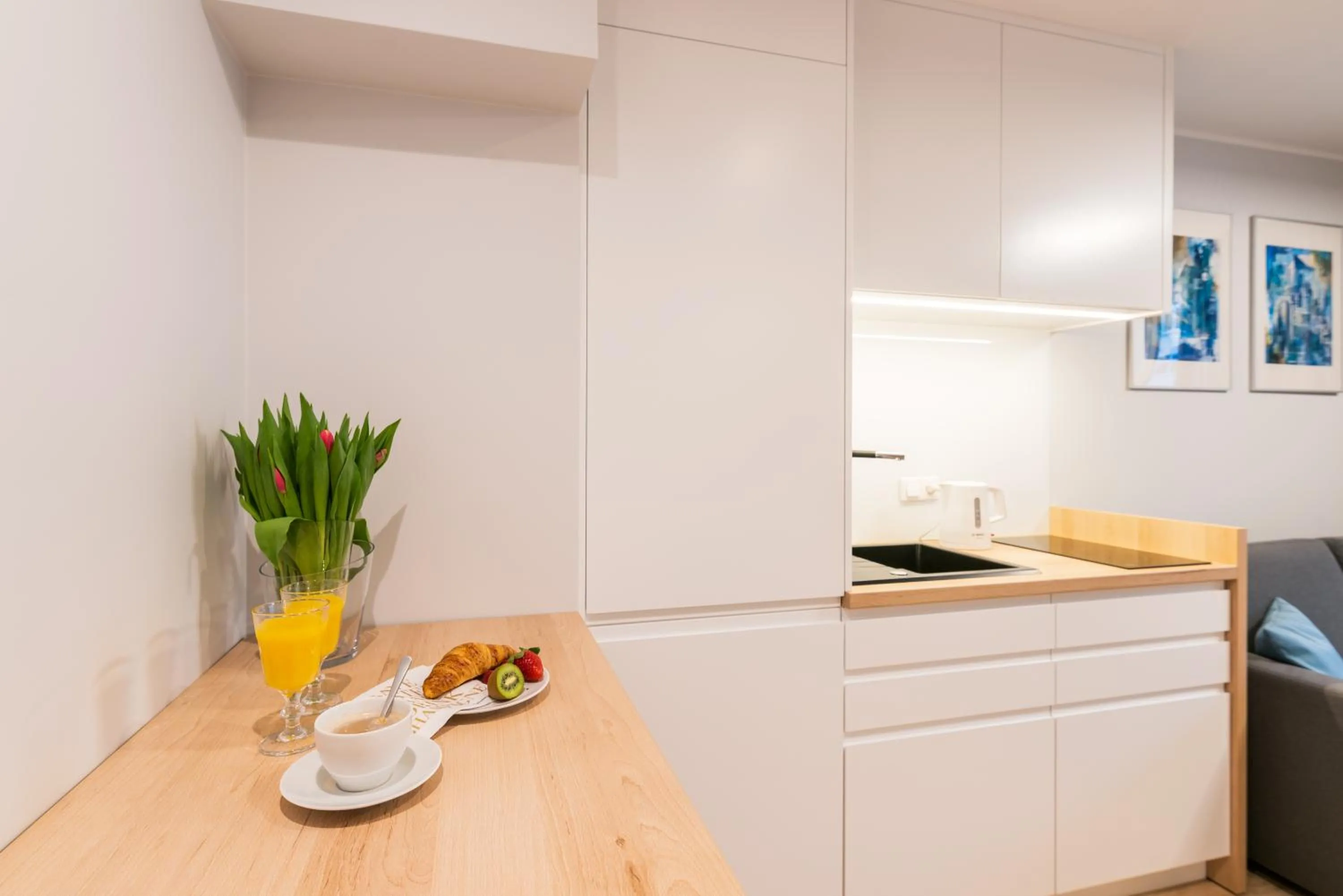 Kitchen or kitchenette in Q17 Apartments Rynek
