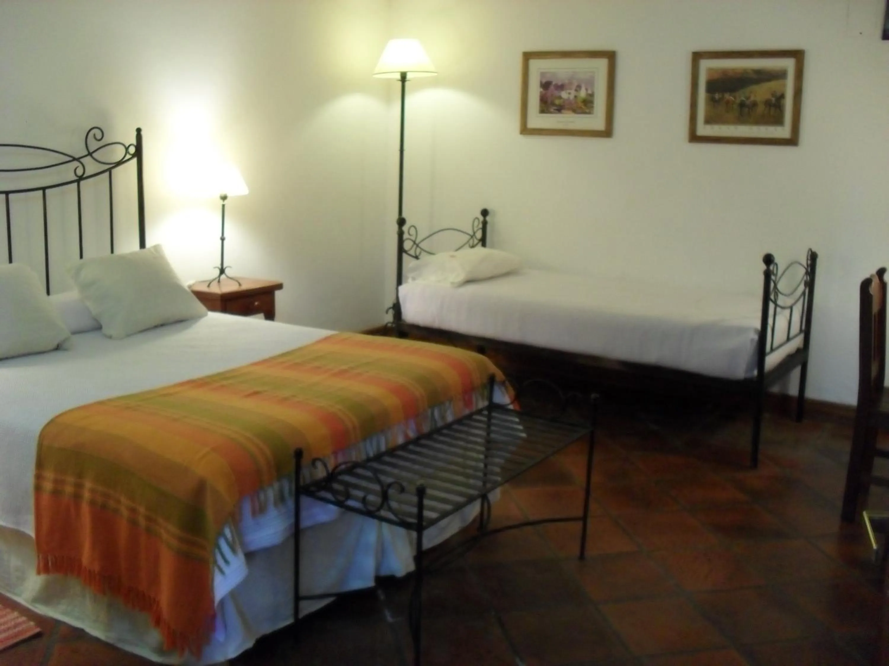 Bedroom, Bed in Hostería Posada del Sol