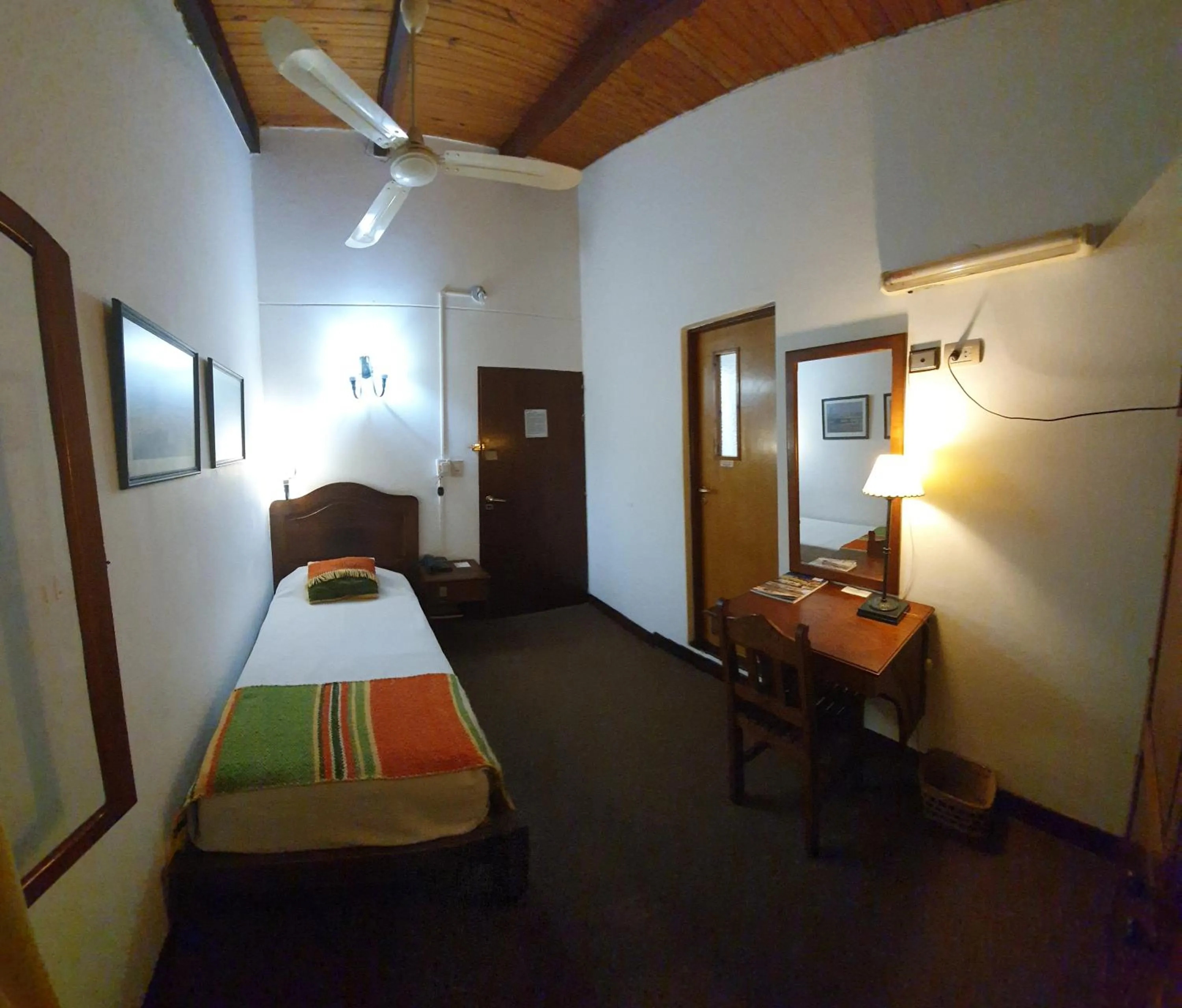 Bedroom, Bed in Hostería Posada del Sol