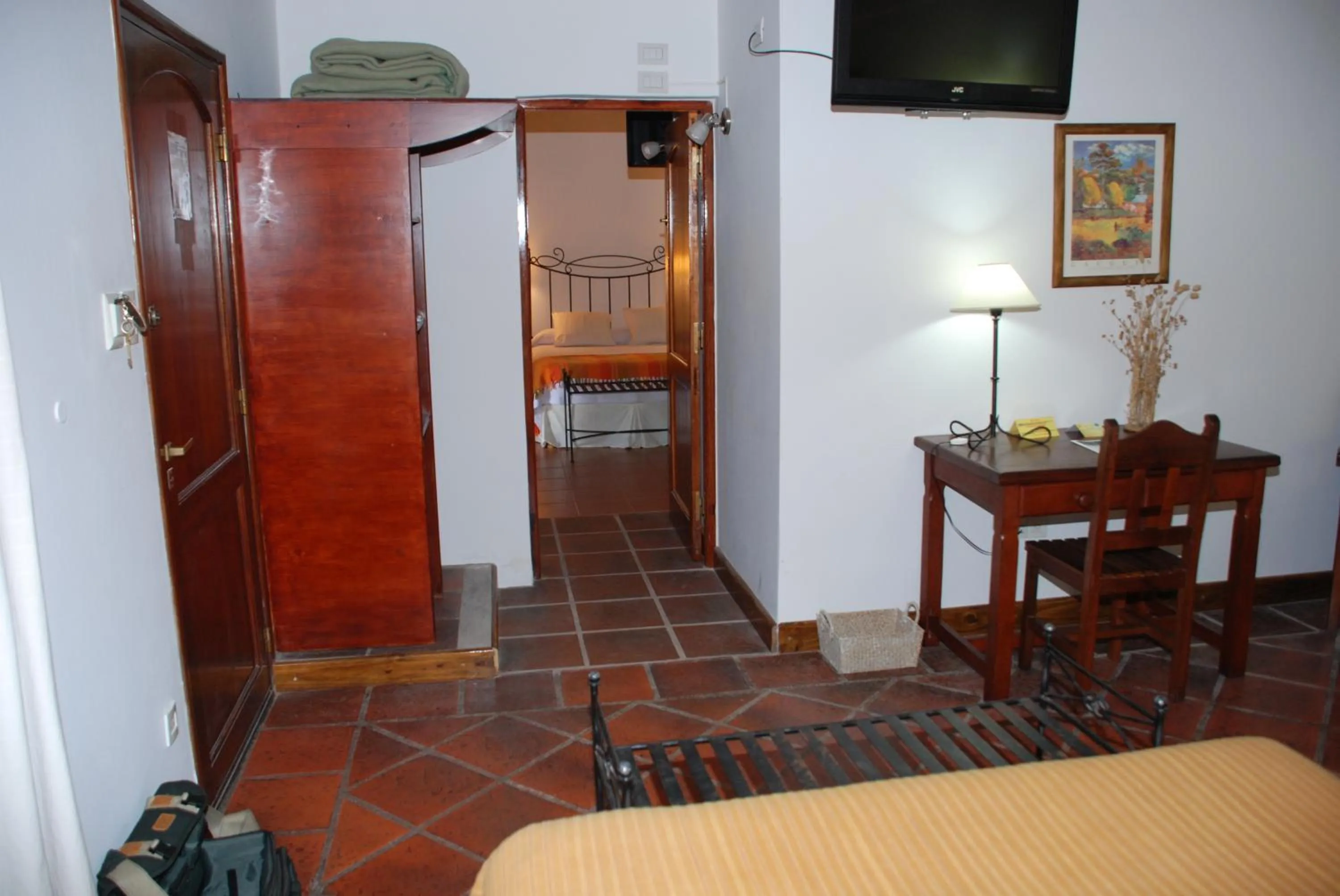 Bedroom in Hostería Posada del Sol