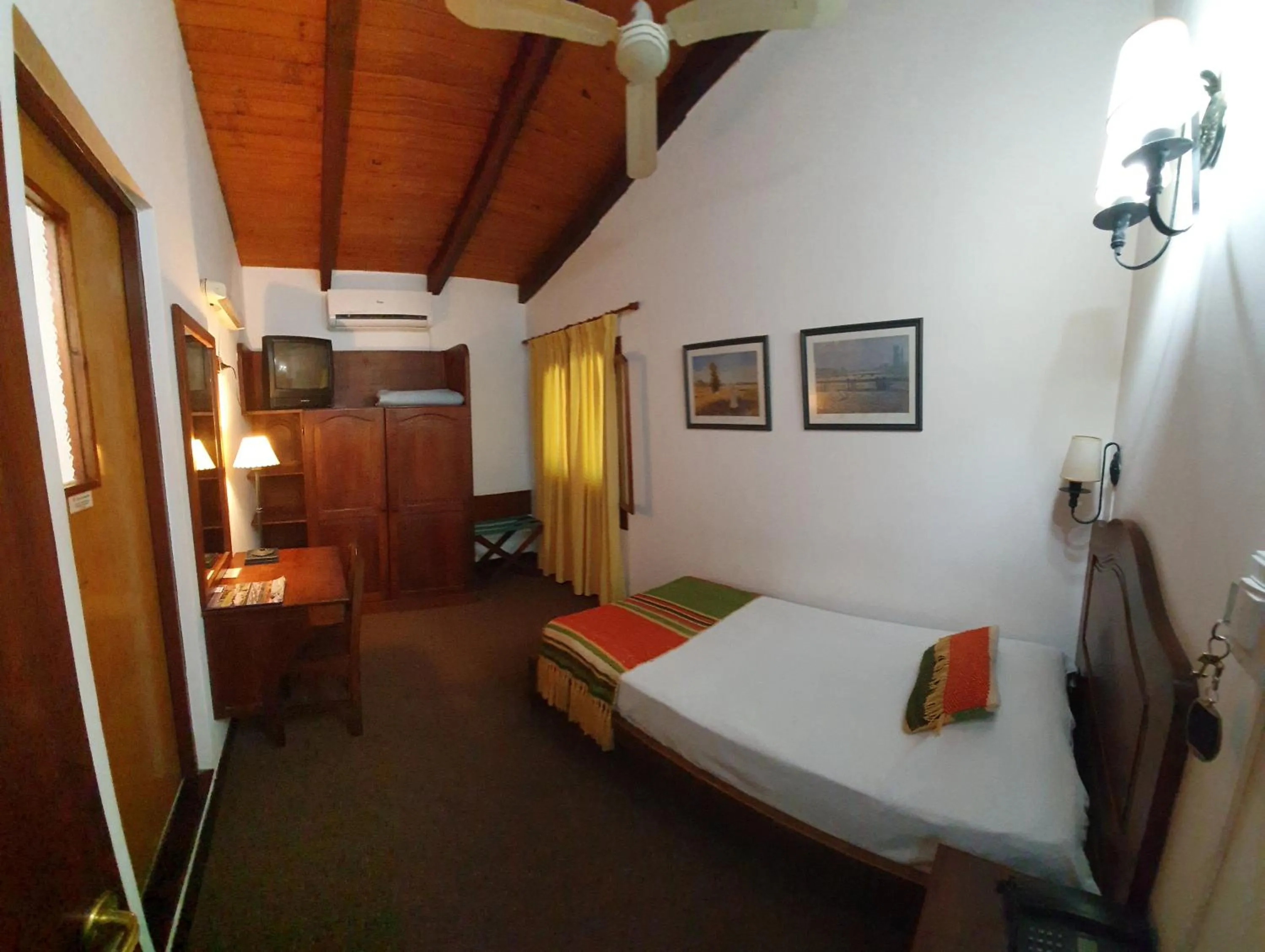 Bed in Hostería Posada del Sol