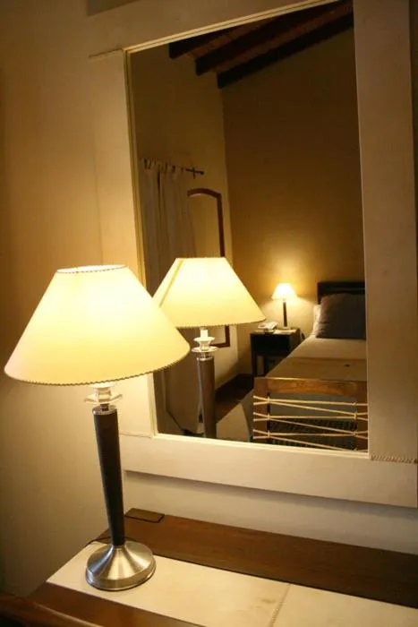 Bed in Hostería Posada del Sol