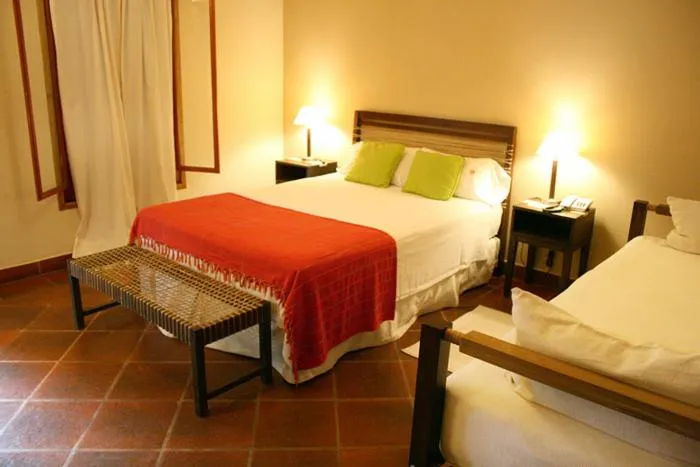Bed in Hostería Posada del Sol