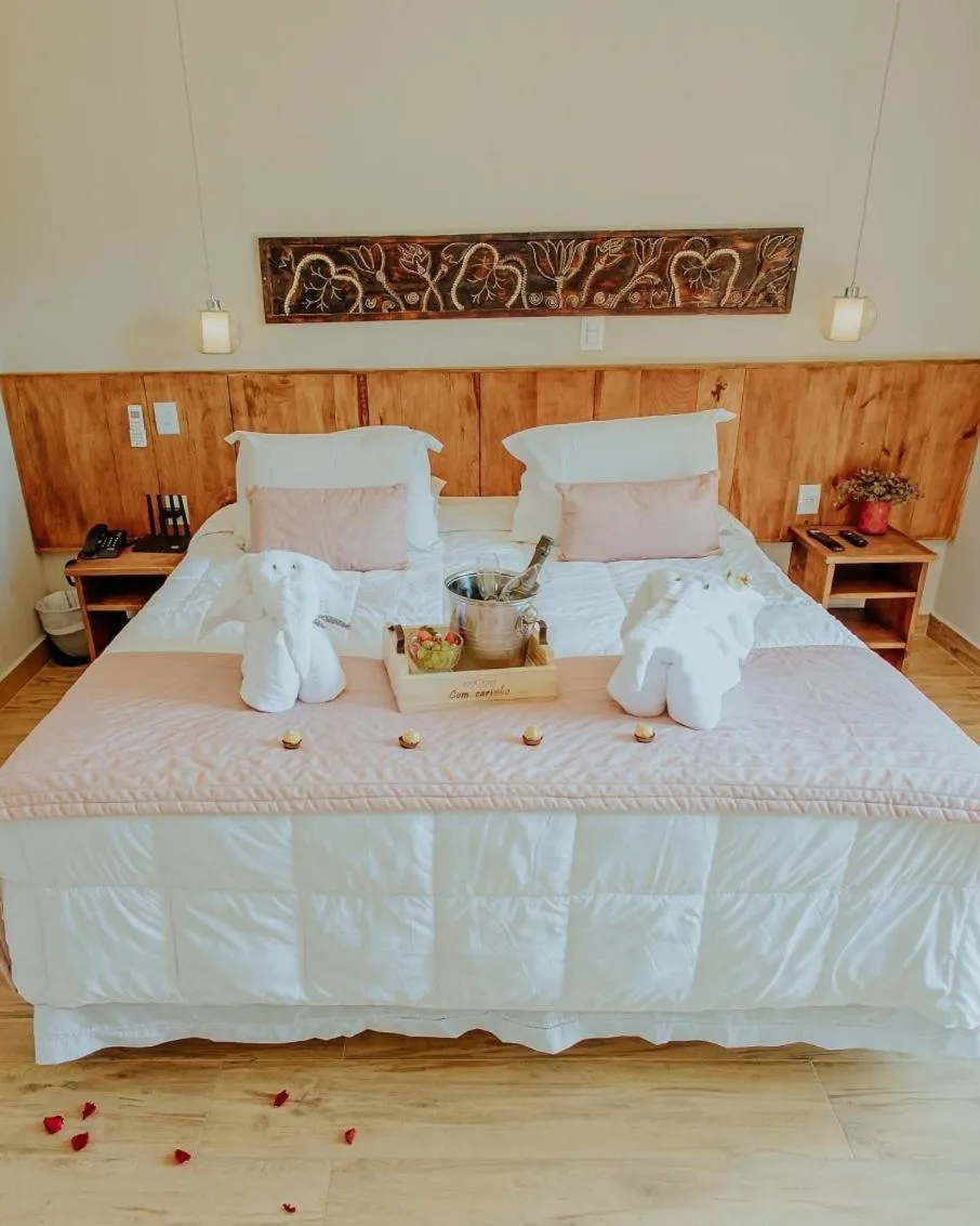 Bed in Hotel Pousada Shangri-la