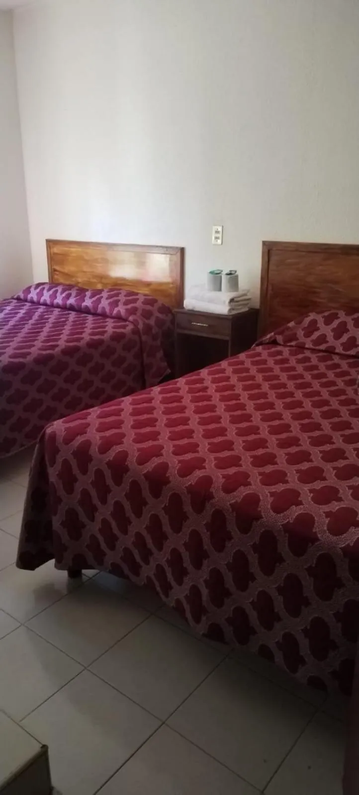Bed in HOTEL MONTALVO