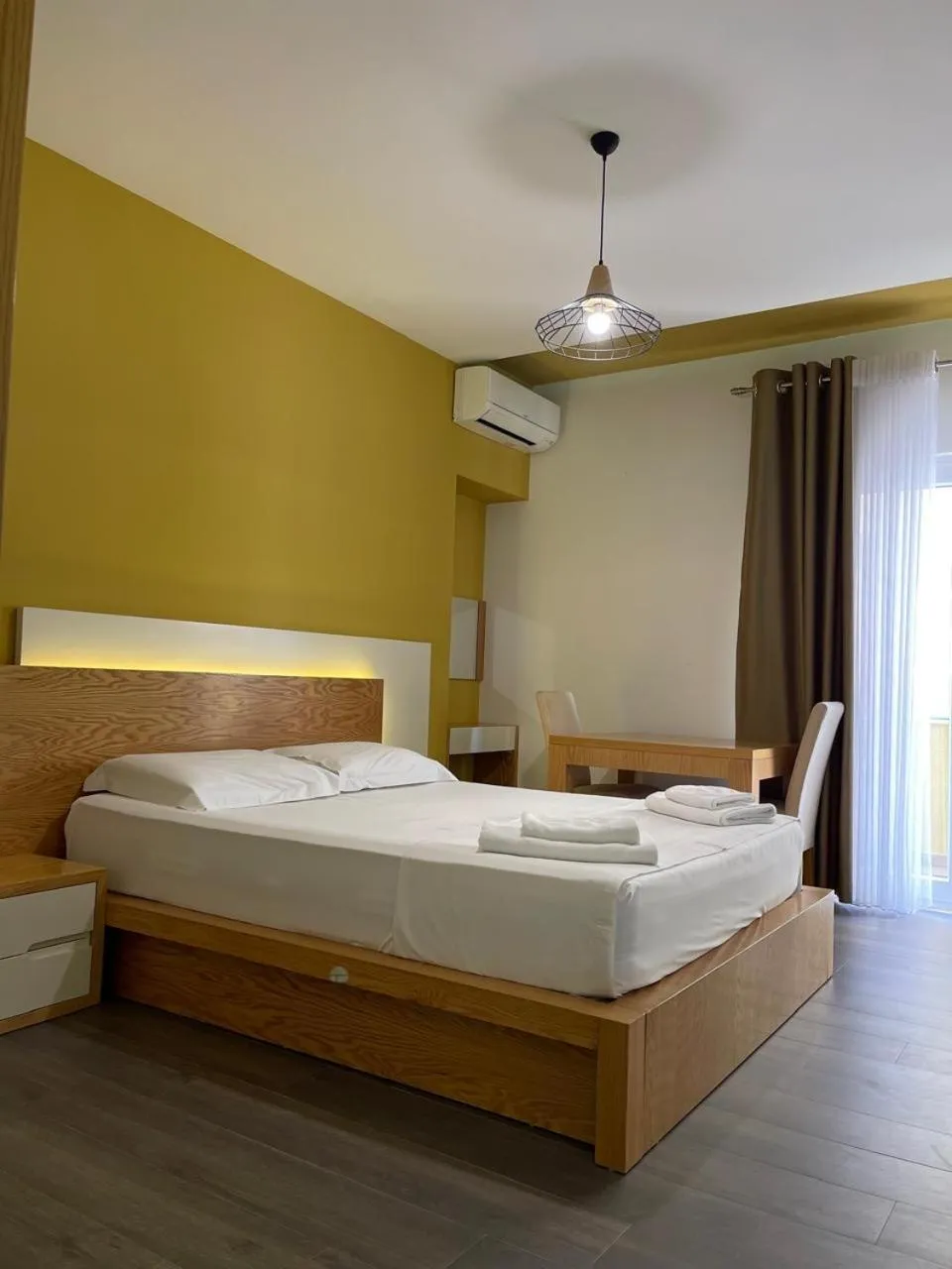 Bed in Sunrise Luxury Apartments