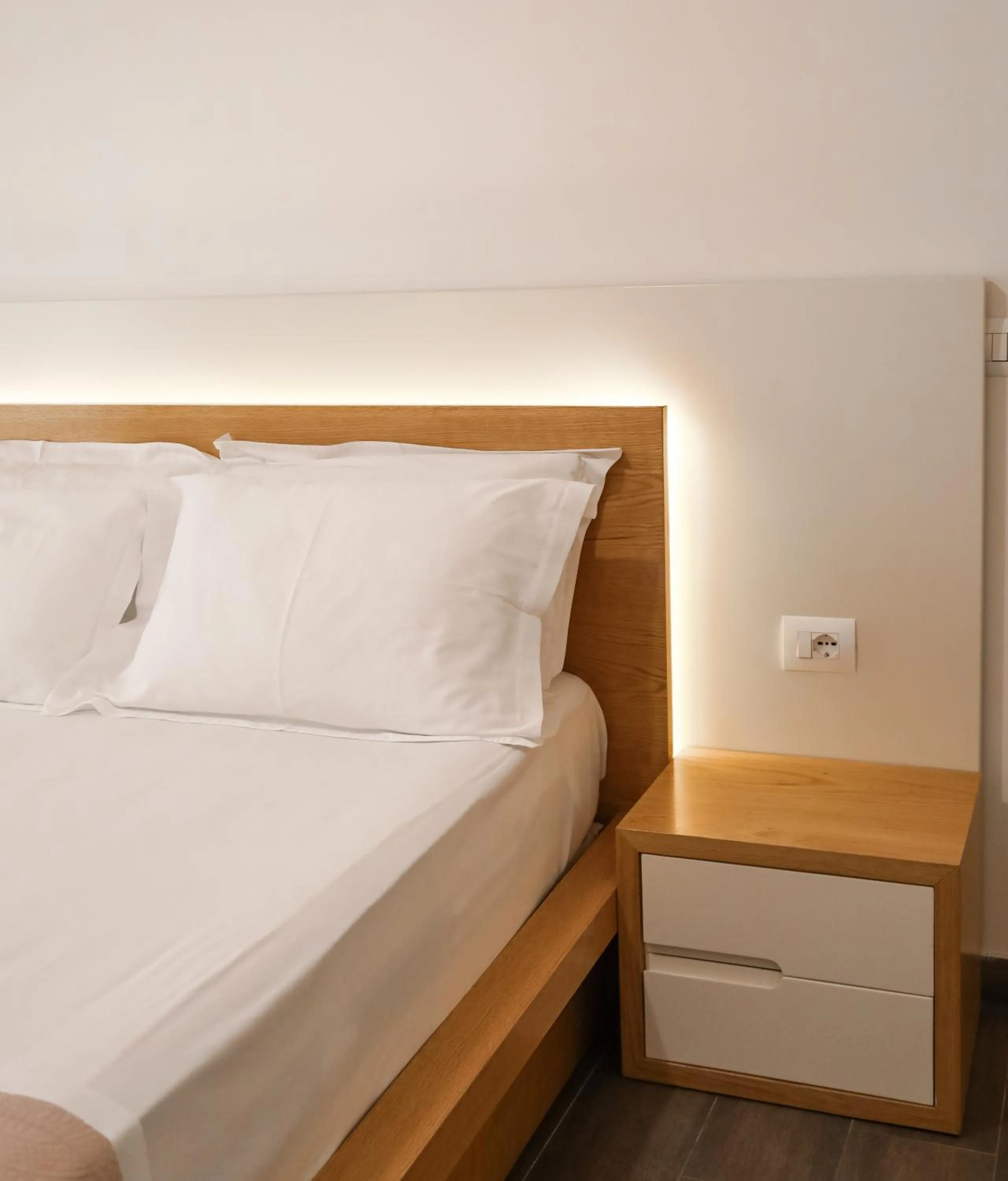 Bed in Sunrise Luxury Apartments